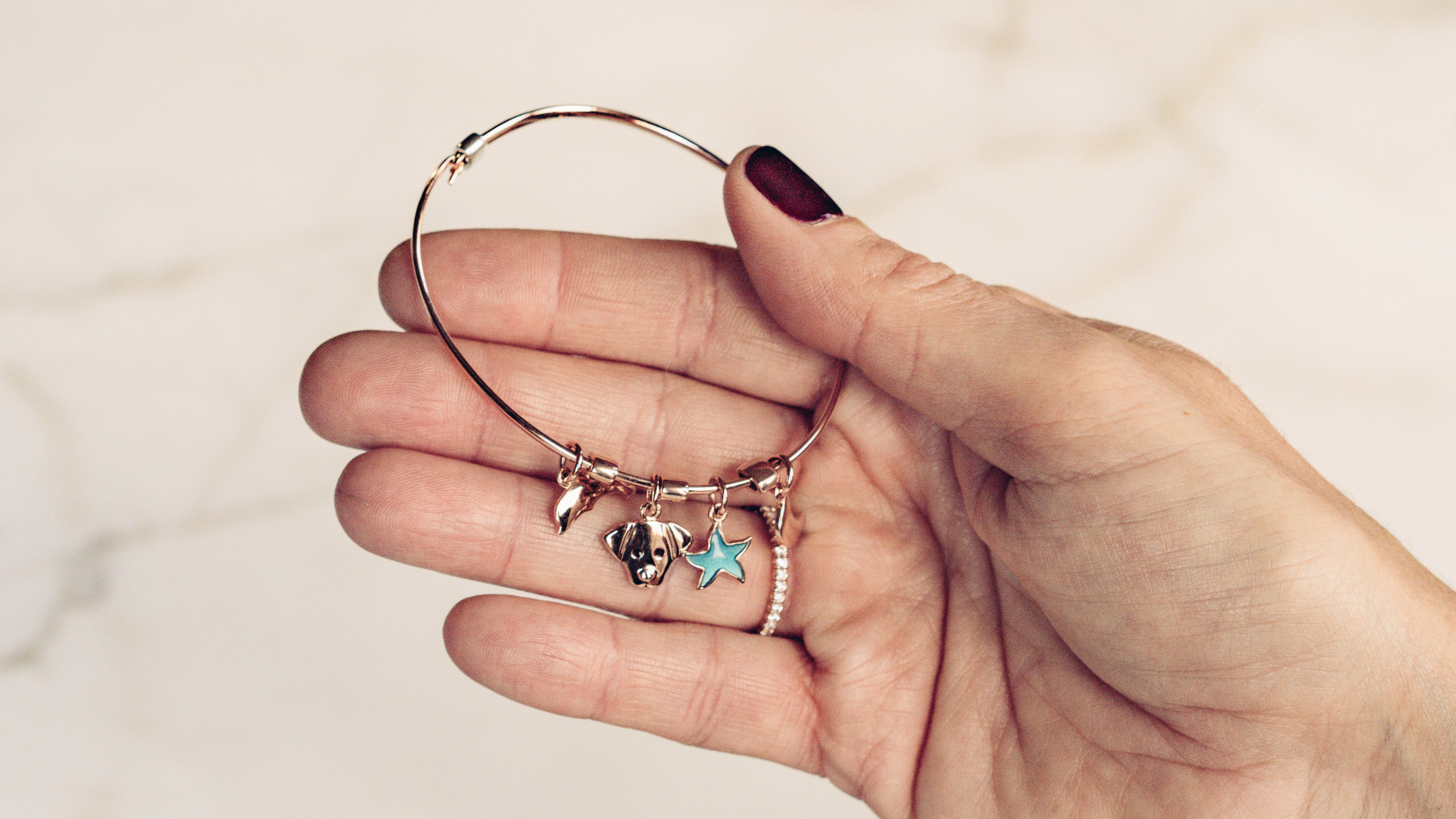 Charm Bracelet trend, The New York Times, fashion-forward accessories, style statement, 3000x1690 HD Desktop