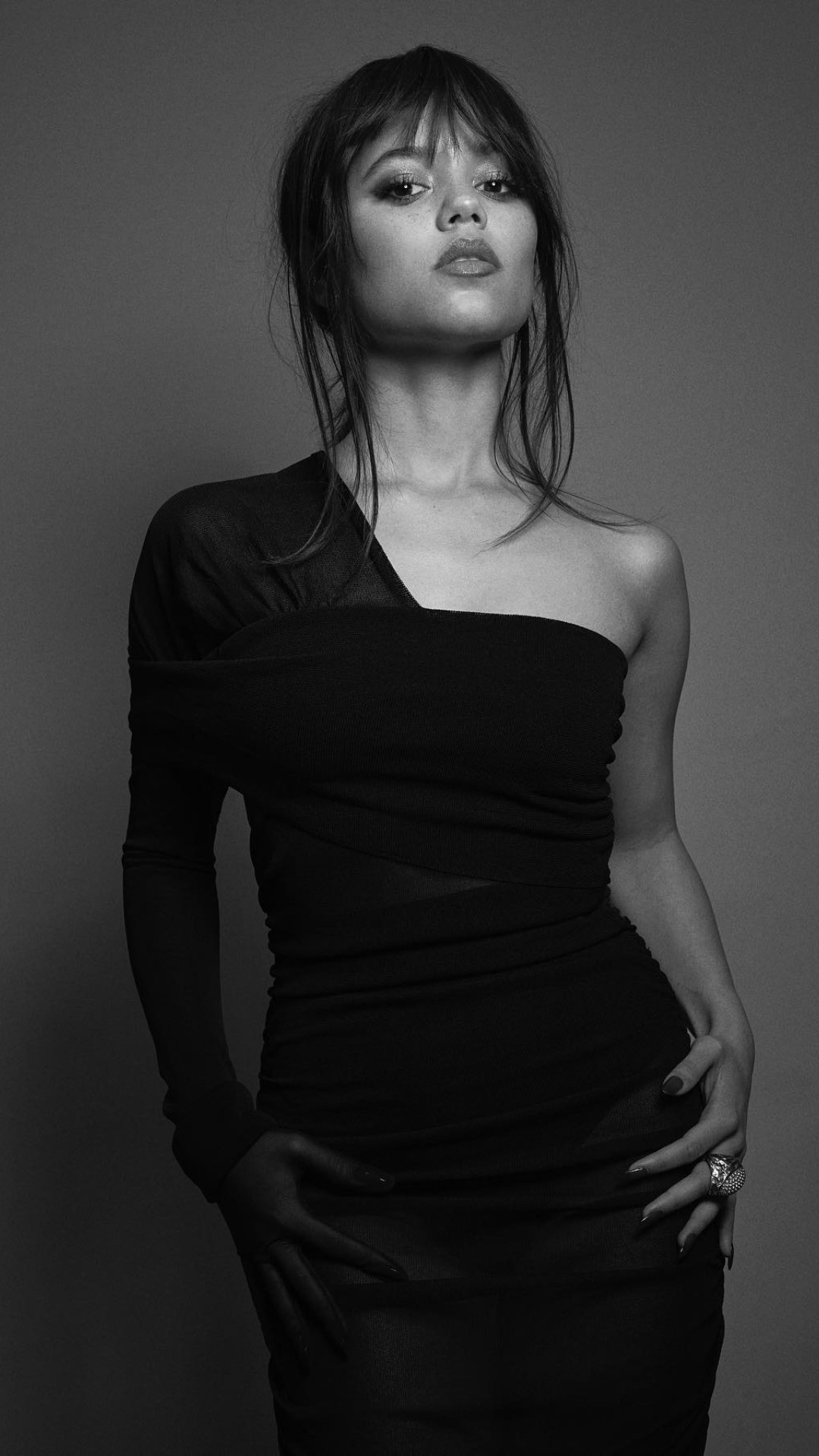 Jenna Ortega, one-shoulder black dress, monochrome studio portrait, Full HD Phone wallpaper