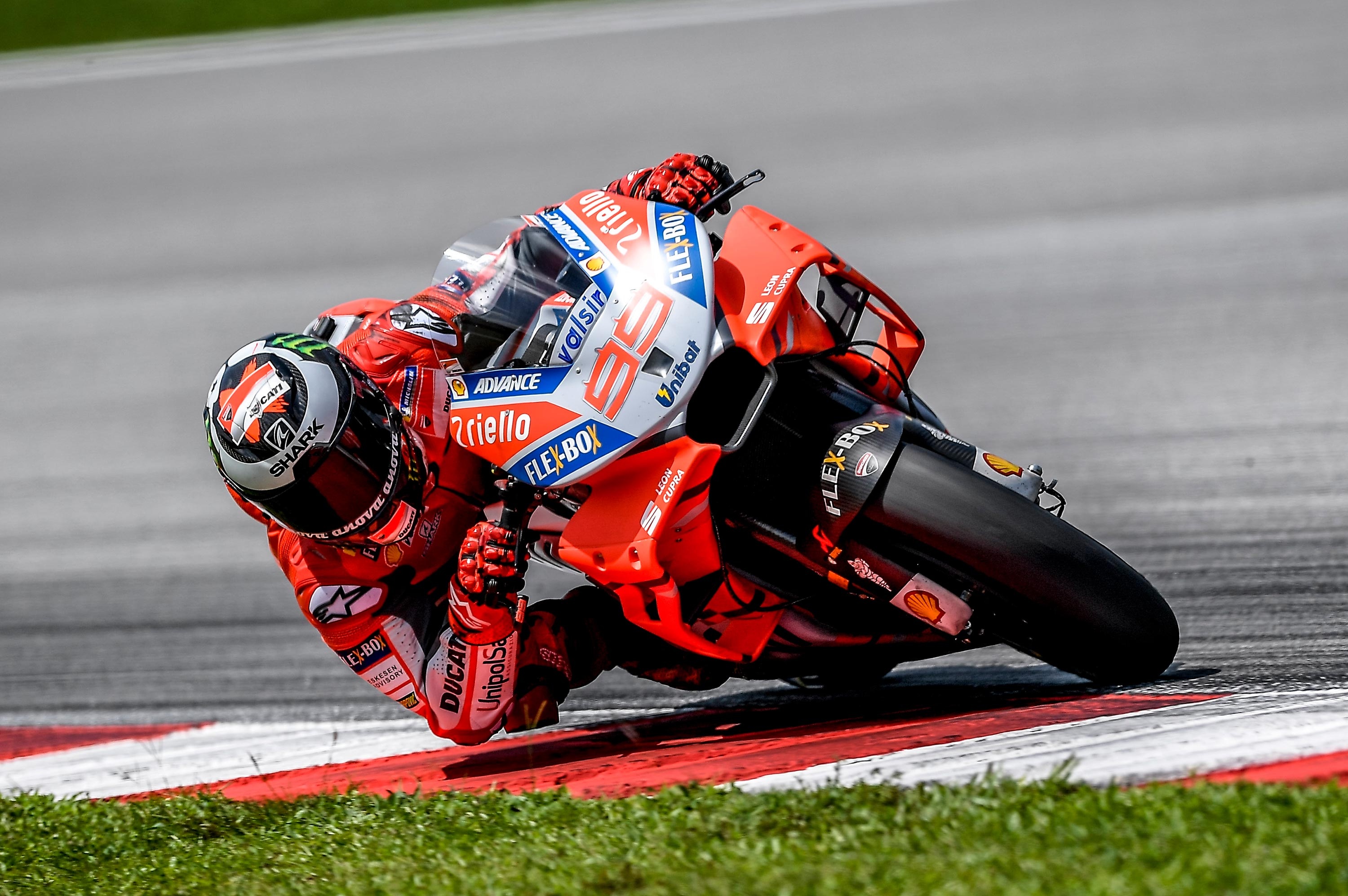 Jorge Lorenzo number 99, Ducati Desmosedici GP red livery, MotoGP knee down kerb, HD Desktop wallpaper