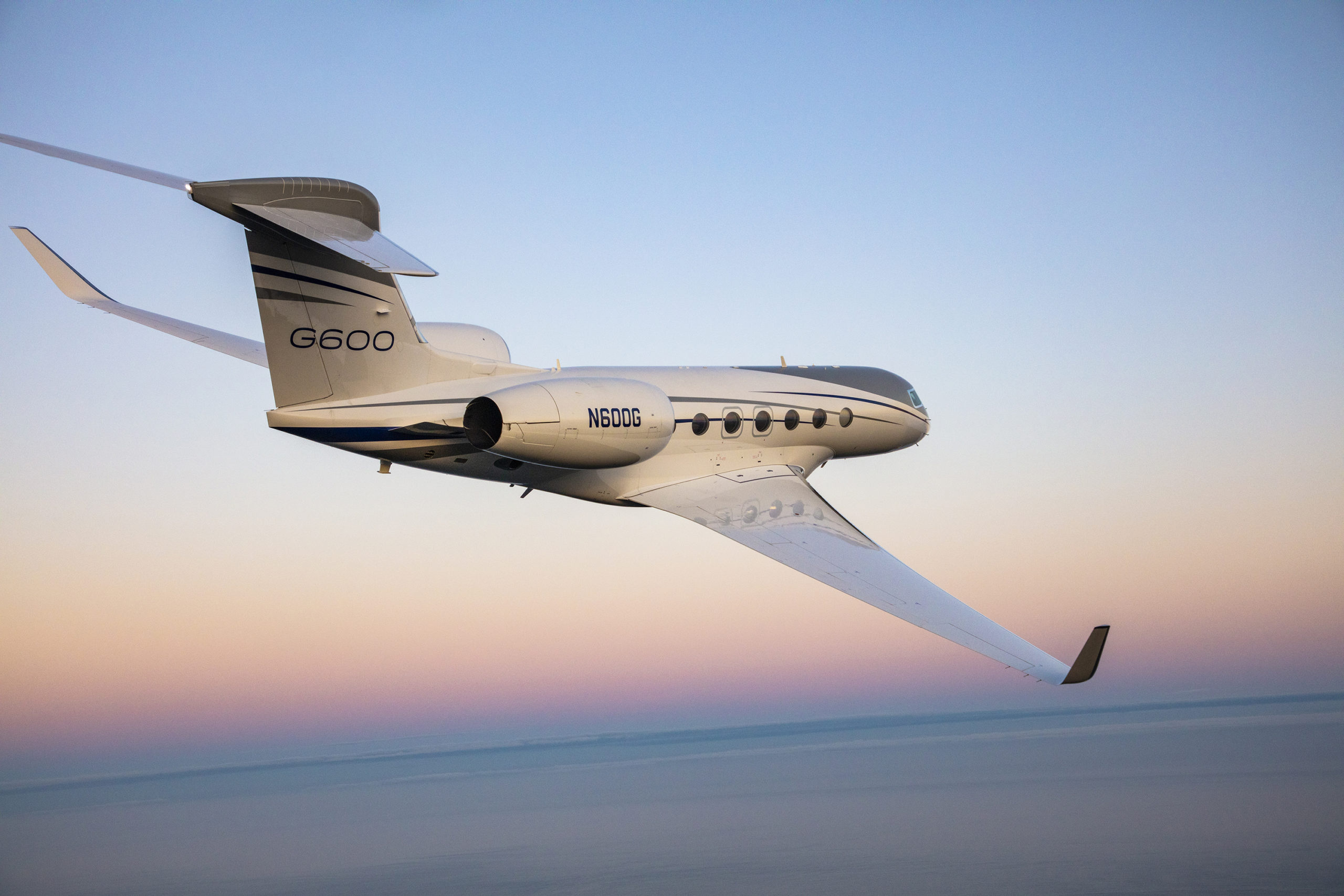 Gulfstream G600 business jet, Swept-wing aircraft in flight, Sunset horizon sky, HD Desktop wallpaper