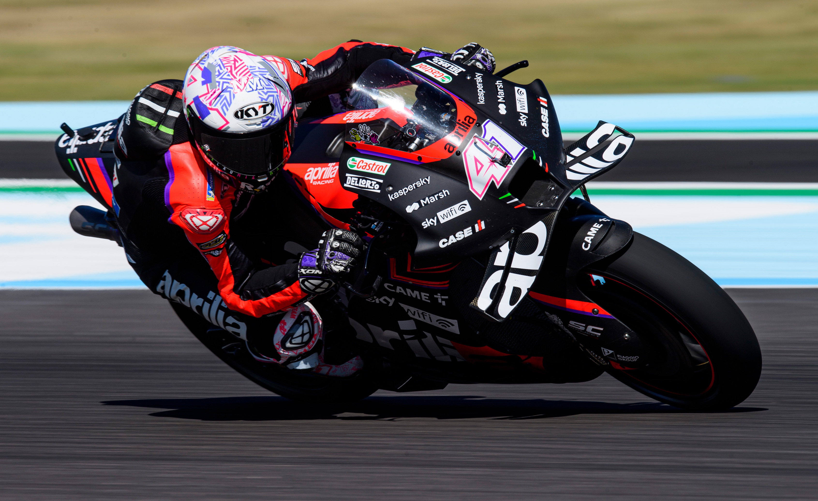 Aleix Espargaro number 41, Aprilia RS-GP black livery, MotoGP lean over blue kerb, HD Desktop wallpaper