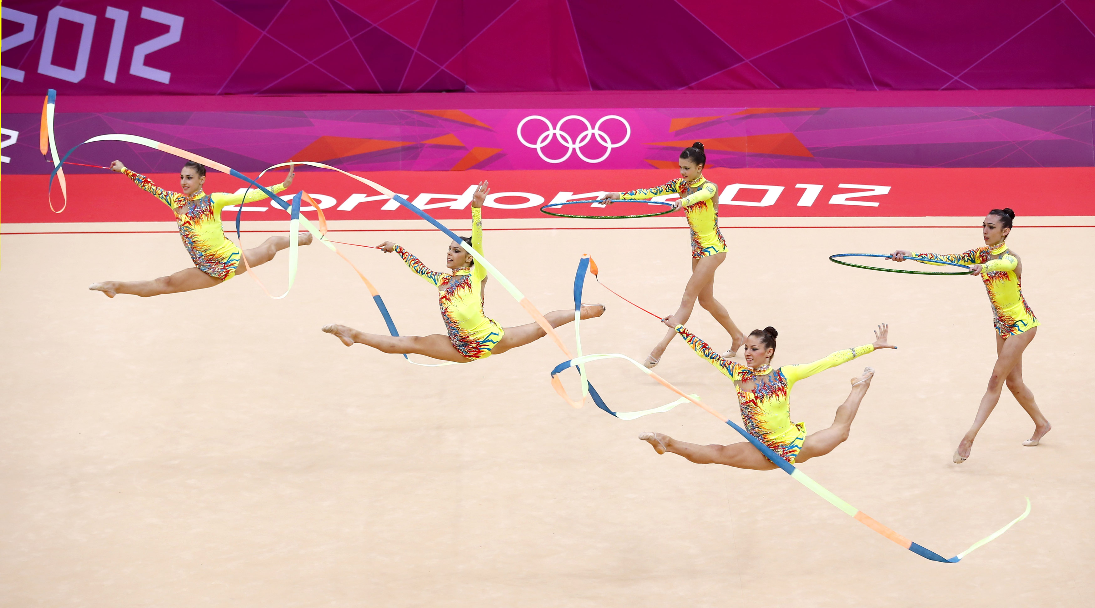 Mid-air leap, Gymnastics Wallpaper, 3500x1950 HD Desktop