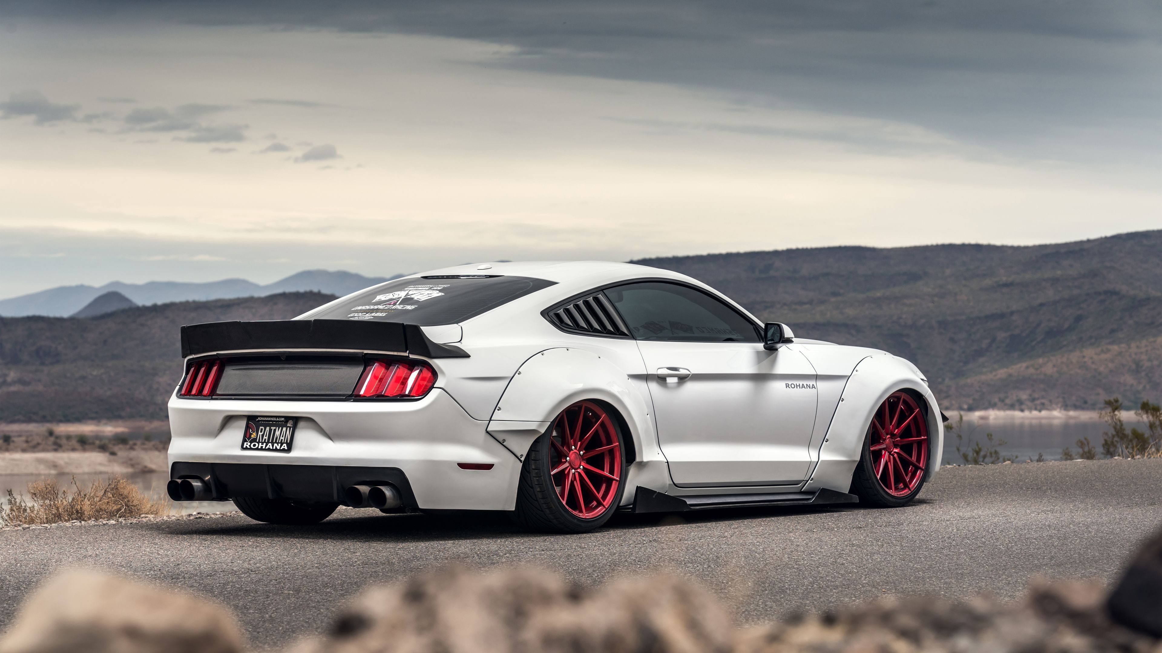 widebody Ford Mustang S550, red Rohana wheels, overcast desert mountain road, 4K Desktop wallpaper
