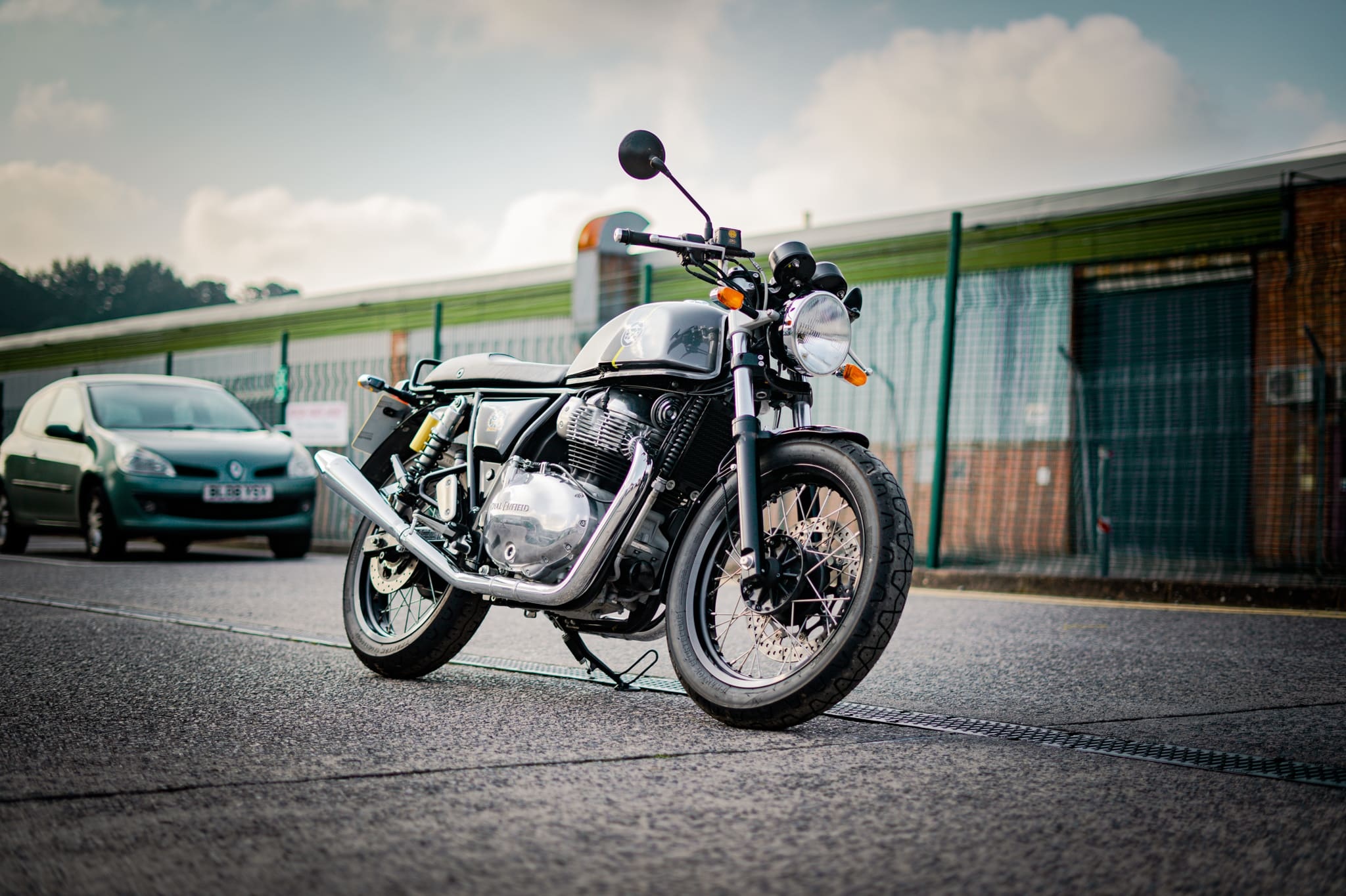 Royal Enfield Continental GT 650, Renault Clio hatchback, Industrial asphalt street, HD Desktop wallpaper