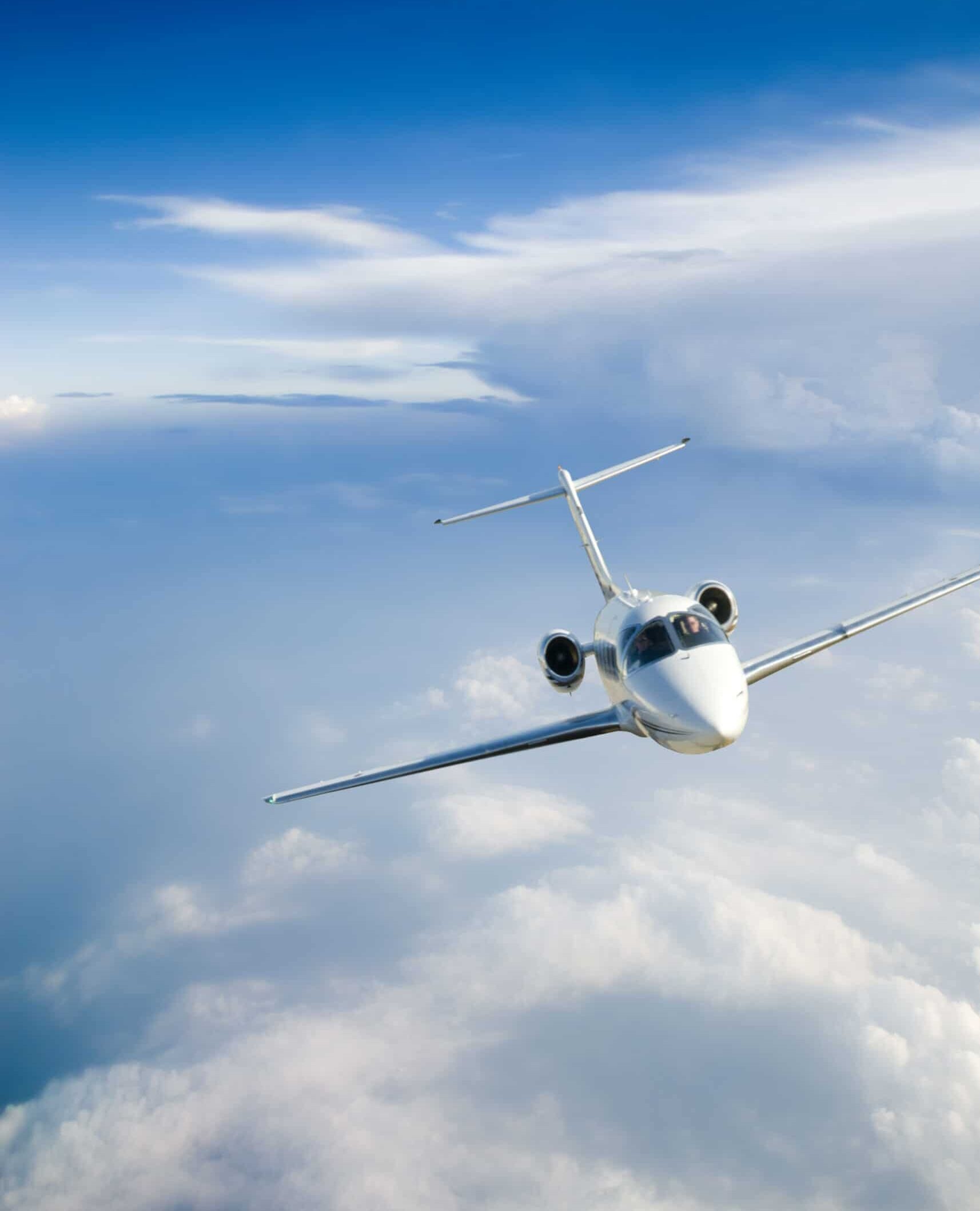 Twin-engine business jet, Cumulus cloud tops, High-altitude blue sky, HD Phone wallpaper