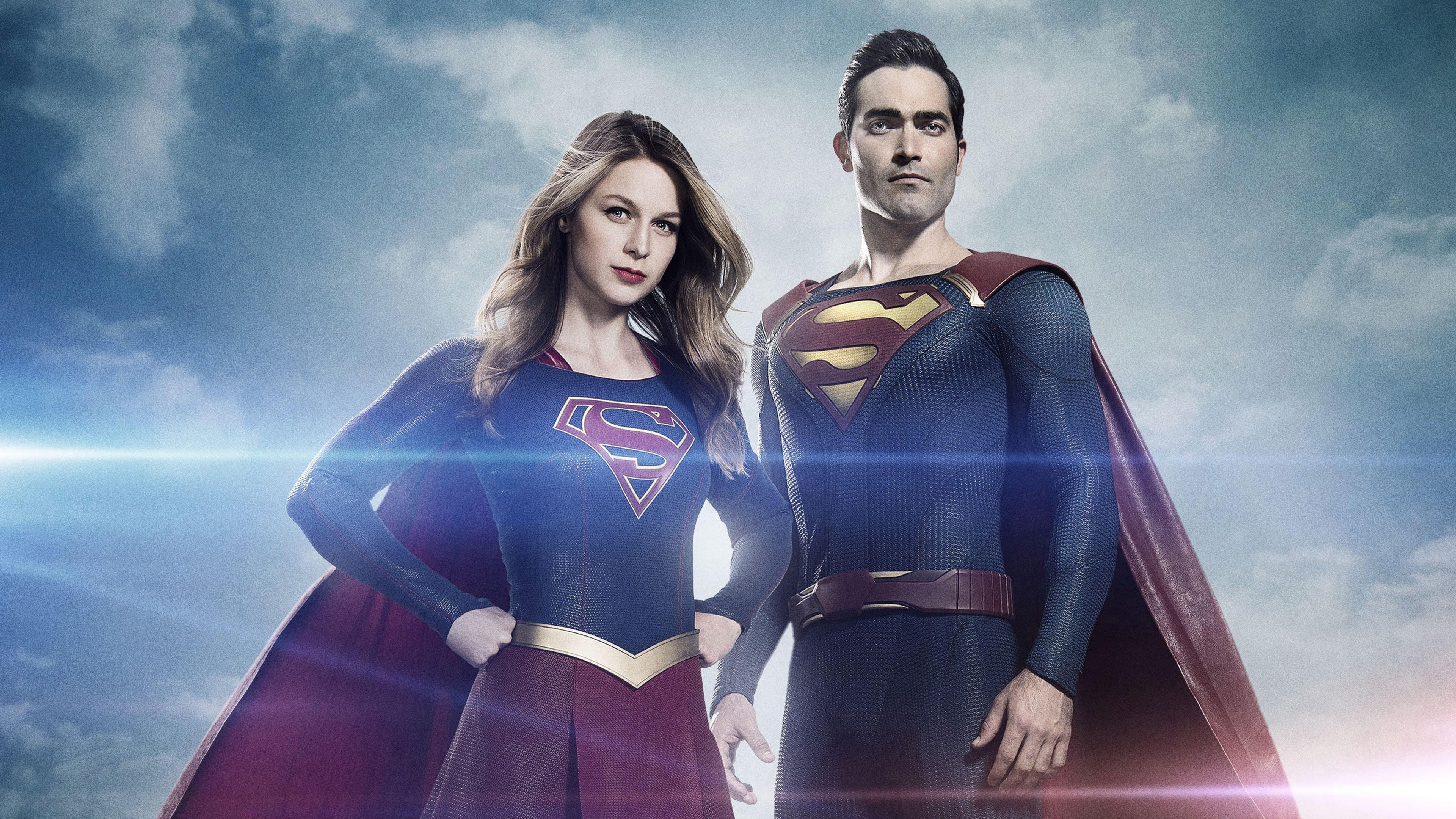 Melissa Benoist as Supergirl, Tyler Hoechlin as Superman, House of El insignia suits, Horizontal lens flare effect, 4K Desktop wallpaper