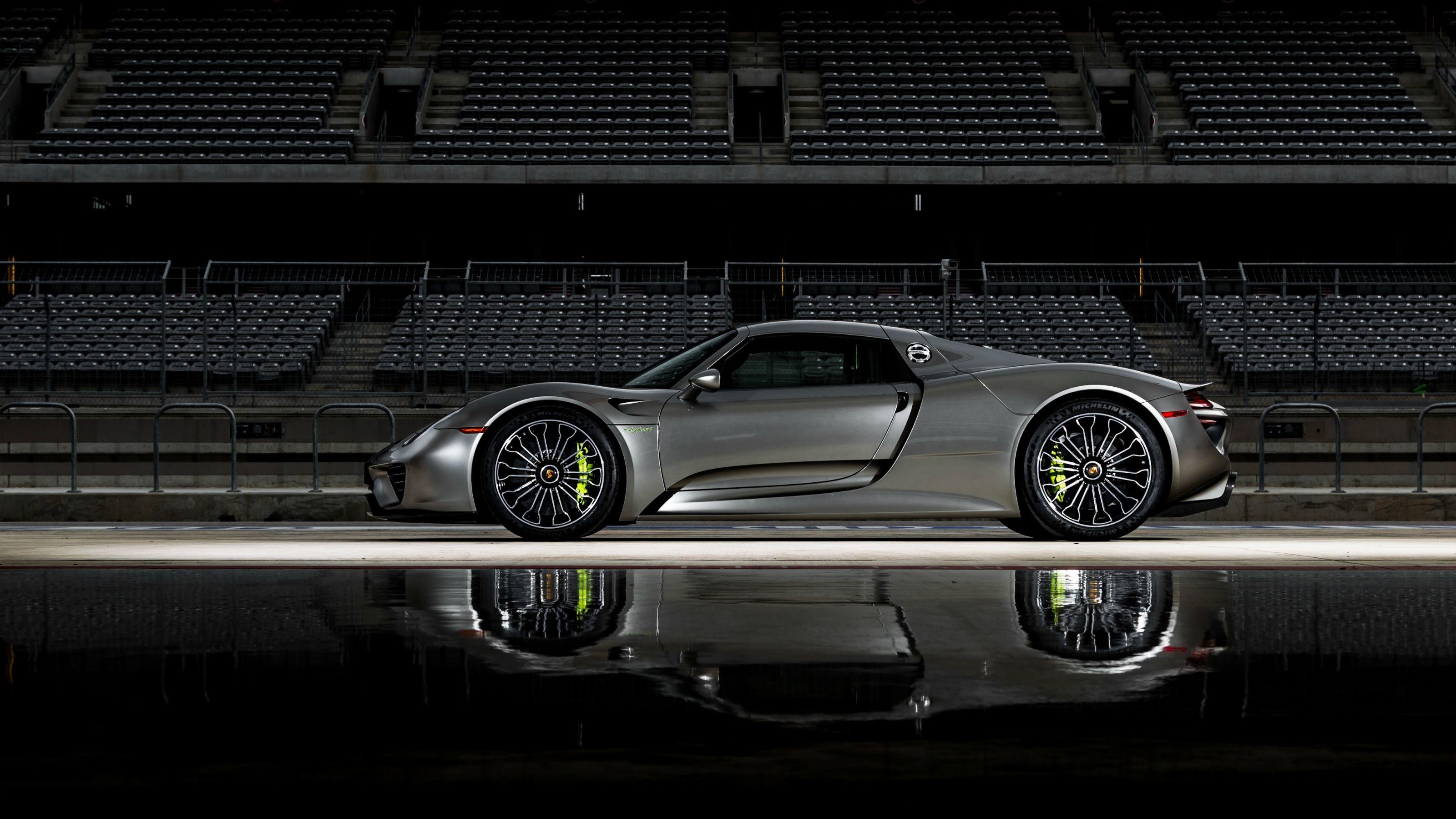 Porsche 918 Spyder, Wet racetrack reflection, Empty stadium grandstand, HD Desktop wallpaper