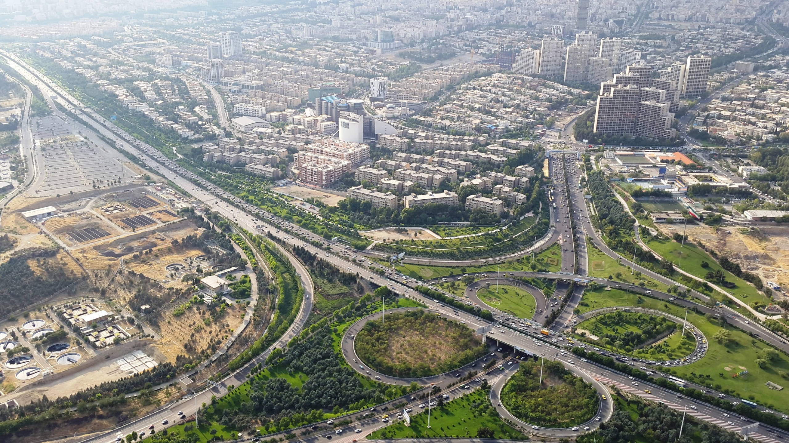Shahrak-e Gharb district, cloverleaf highway interchange, aerial Tehran cityscape, HD Desktop wallpaper