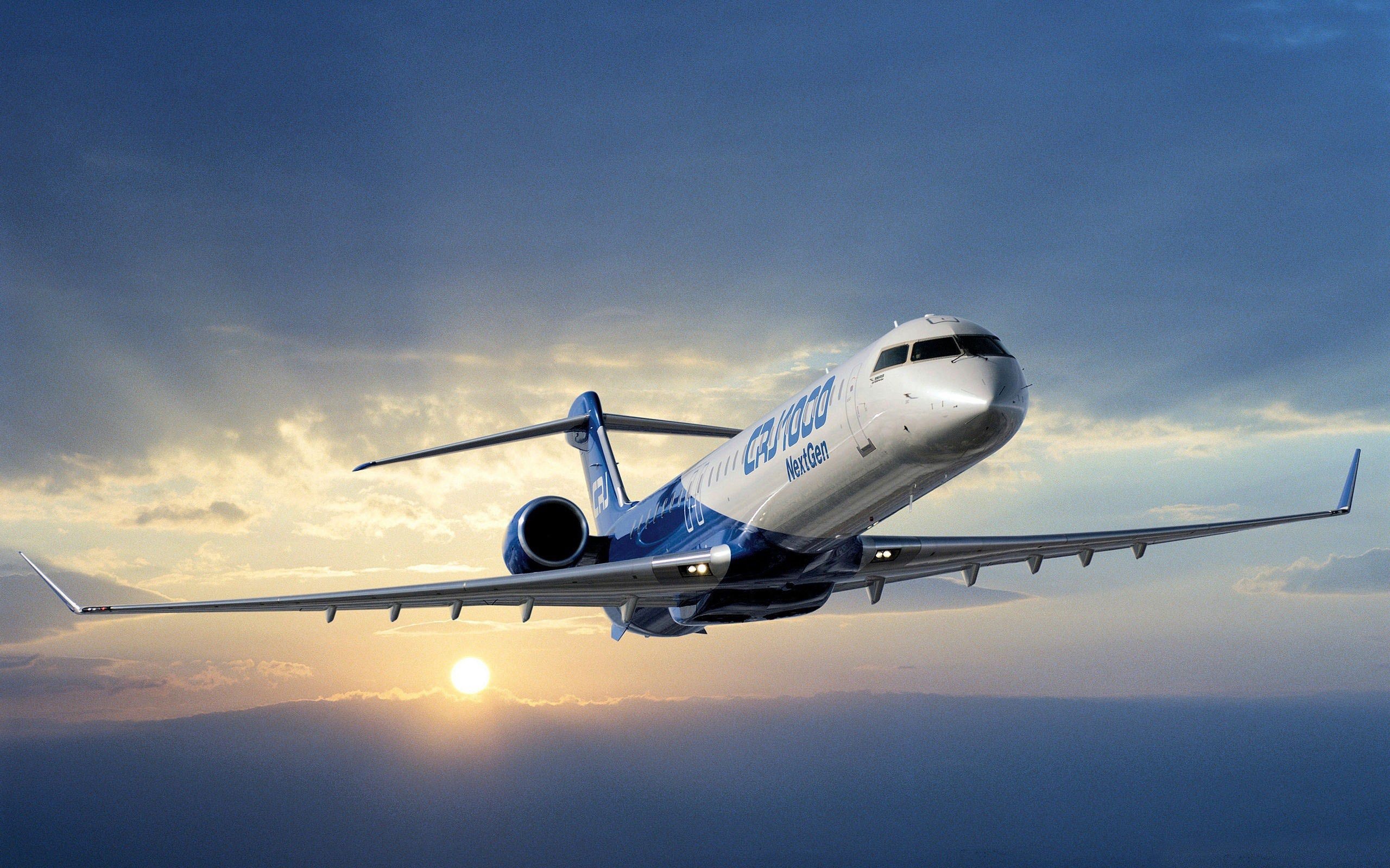 Bombardier CRJ1000 NextGen, High-altitude flight, Golden sunset above clouds, HD Desktop wallpaper
