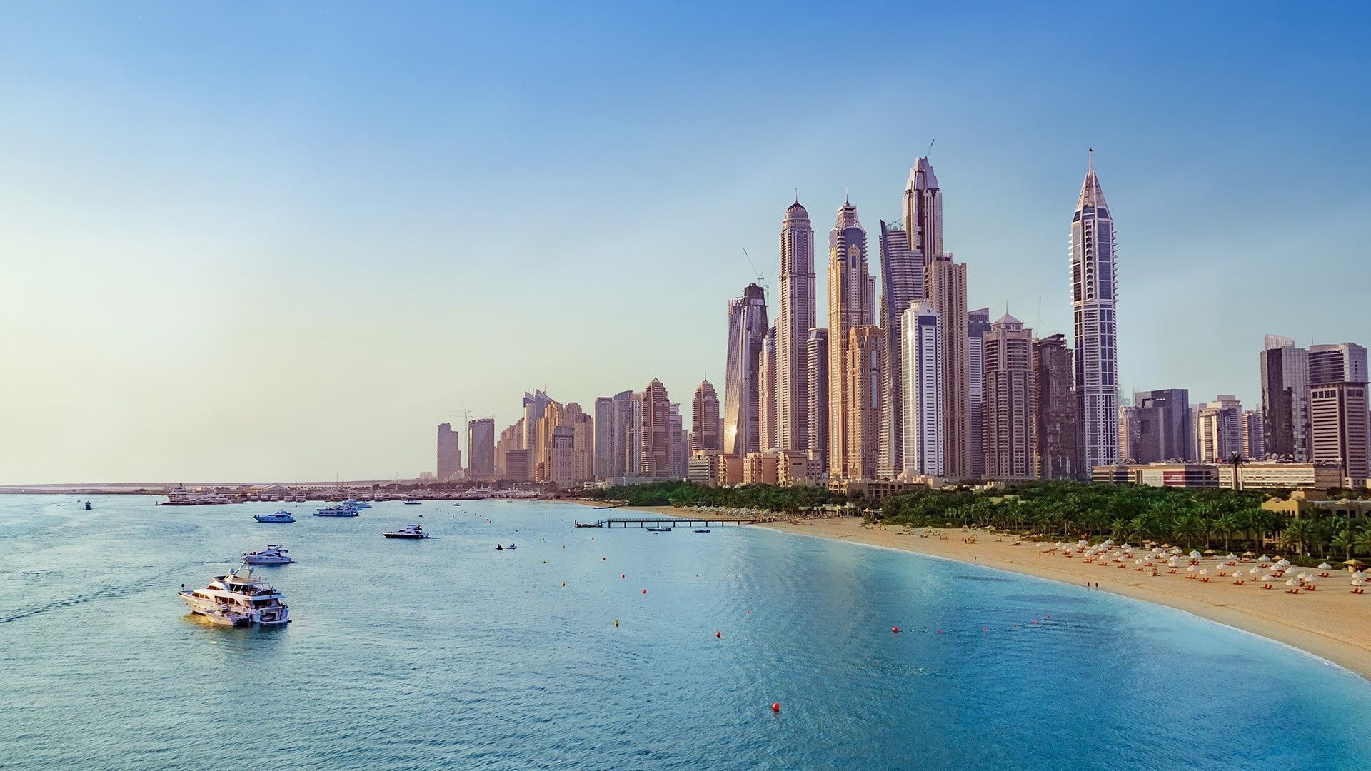 Beach with boats near Dubai Marina 1920x1080