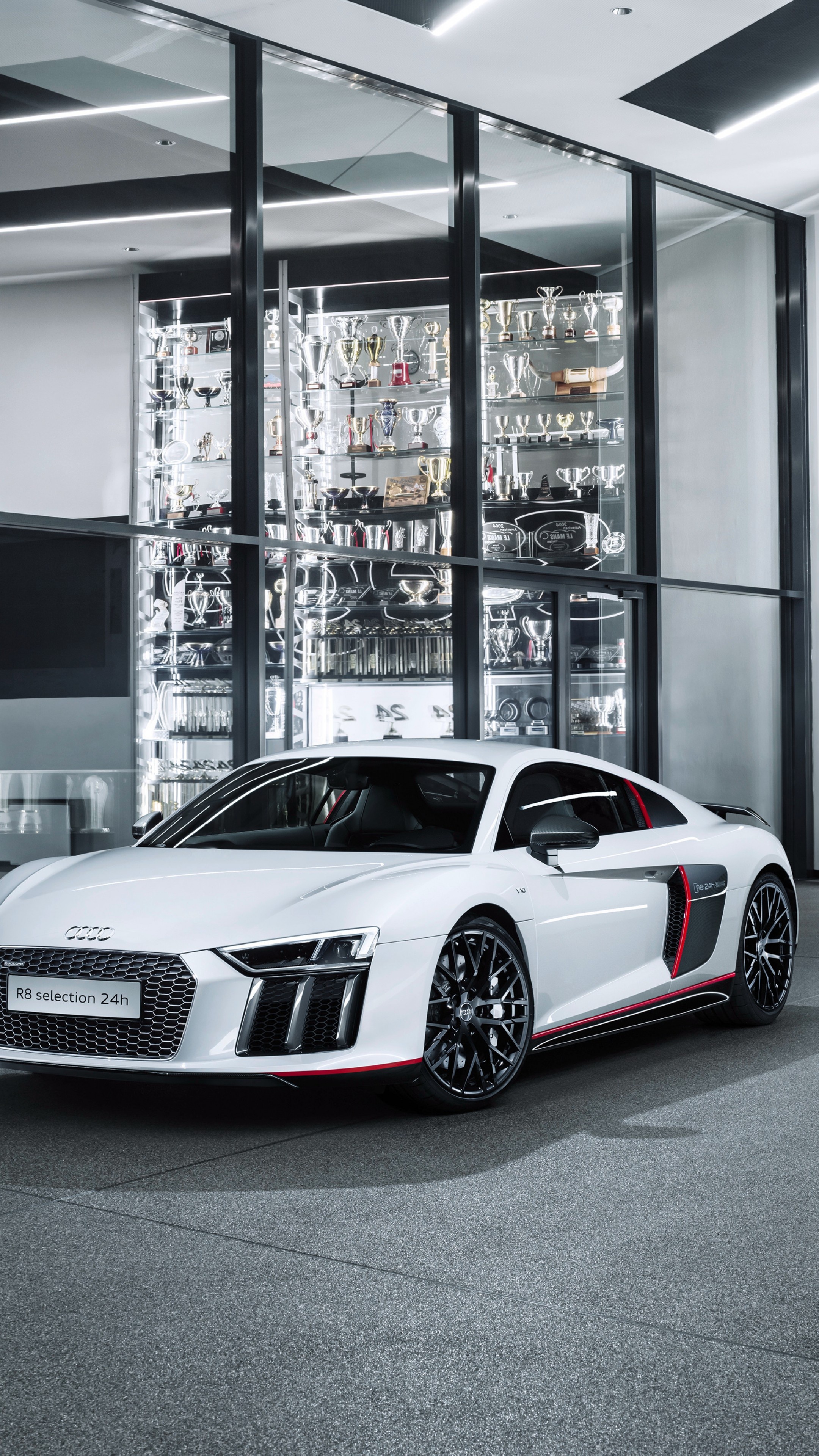 Audi R8 selection 24h, glass trophy showcase, modern car showroom, 4K Phone wallpaper