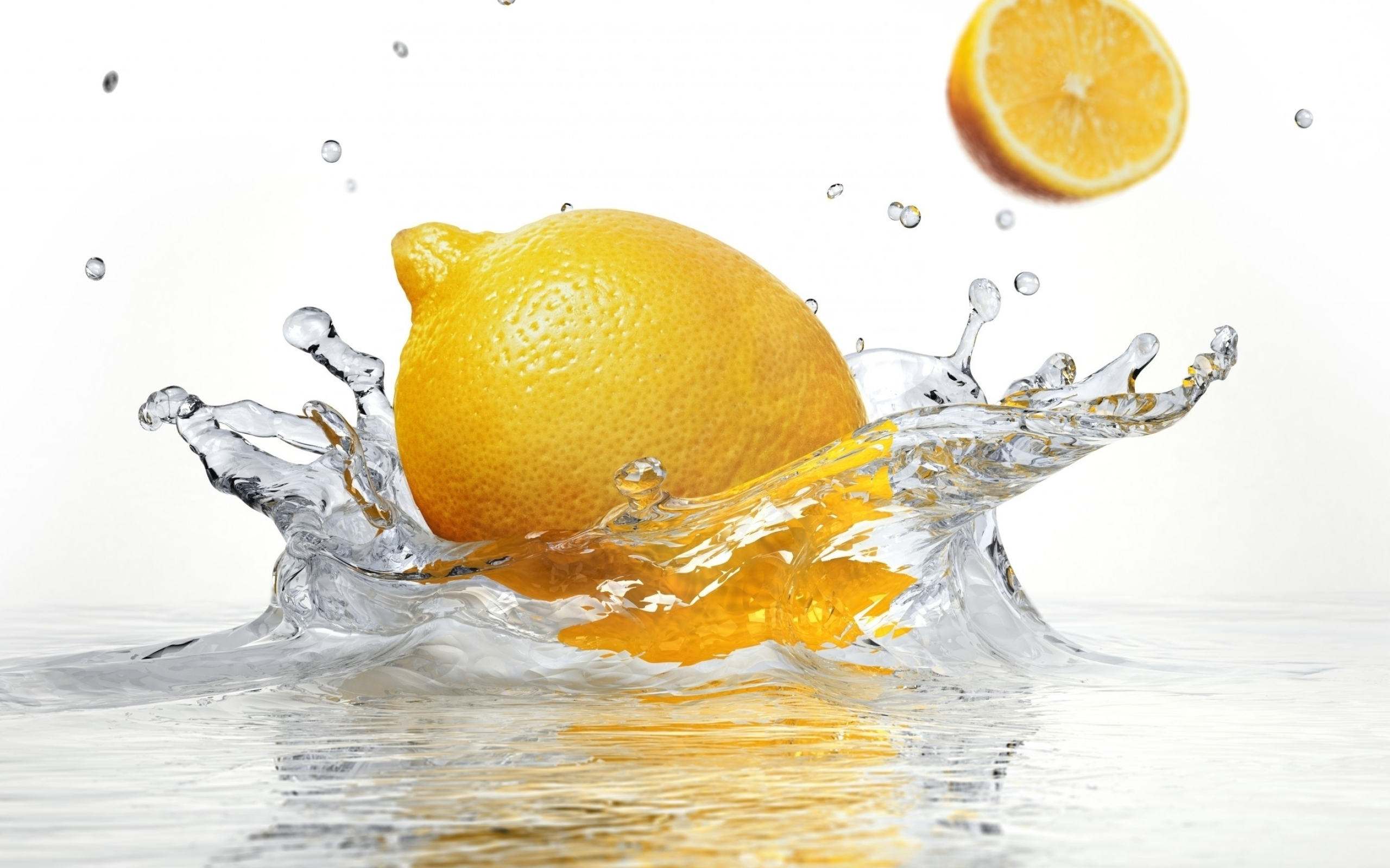 Falling lemon, Crystal clear water, Captivating photography, Wallpaper wonder, 2560x1600 HD Desktop