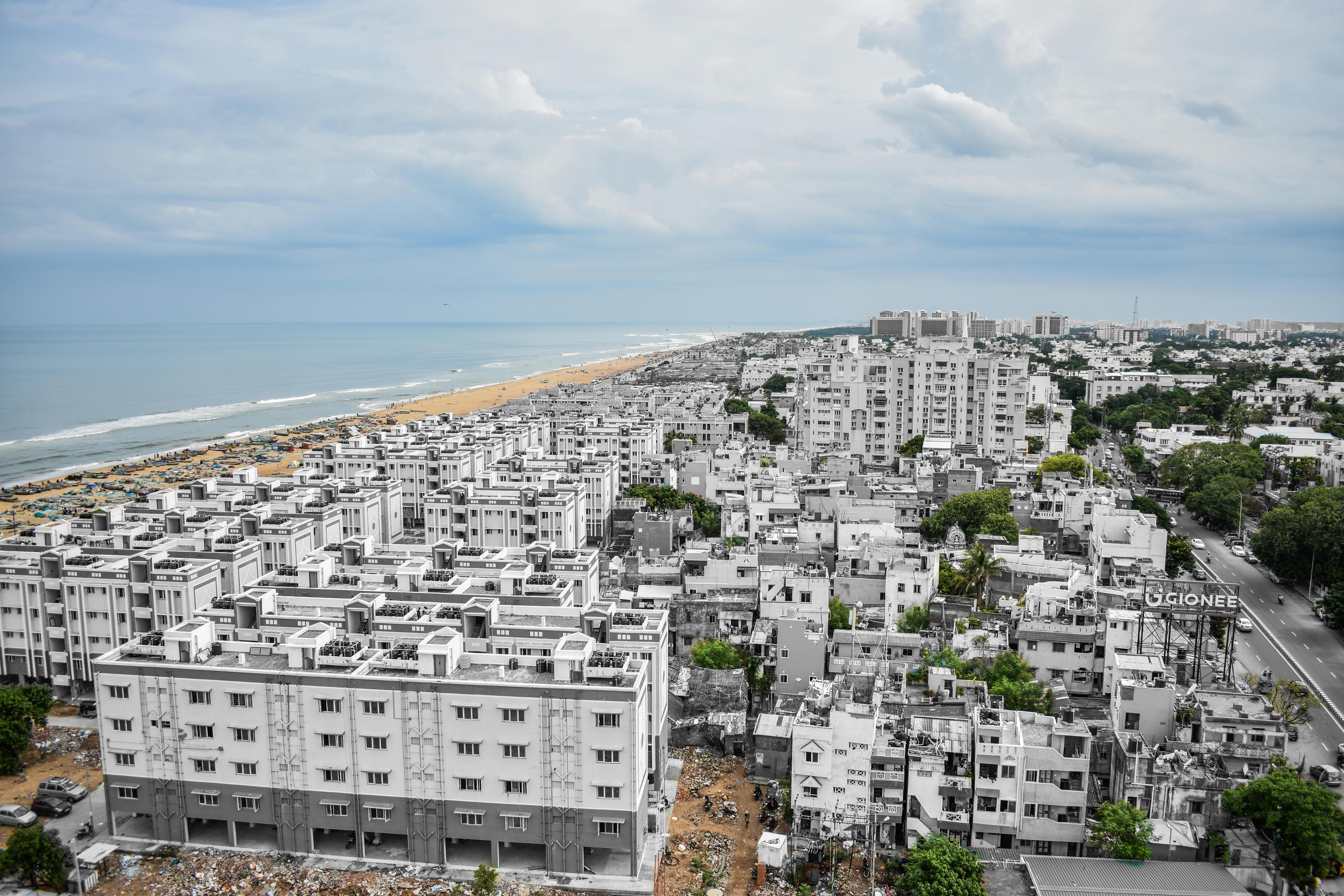 Cloudy Sky above Buildings Near Marina 6000x4000