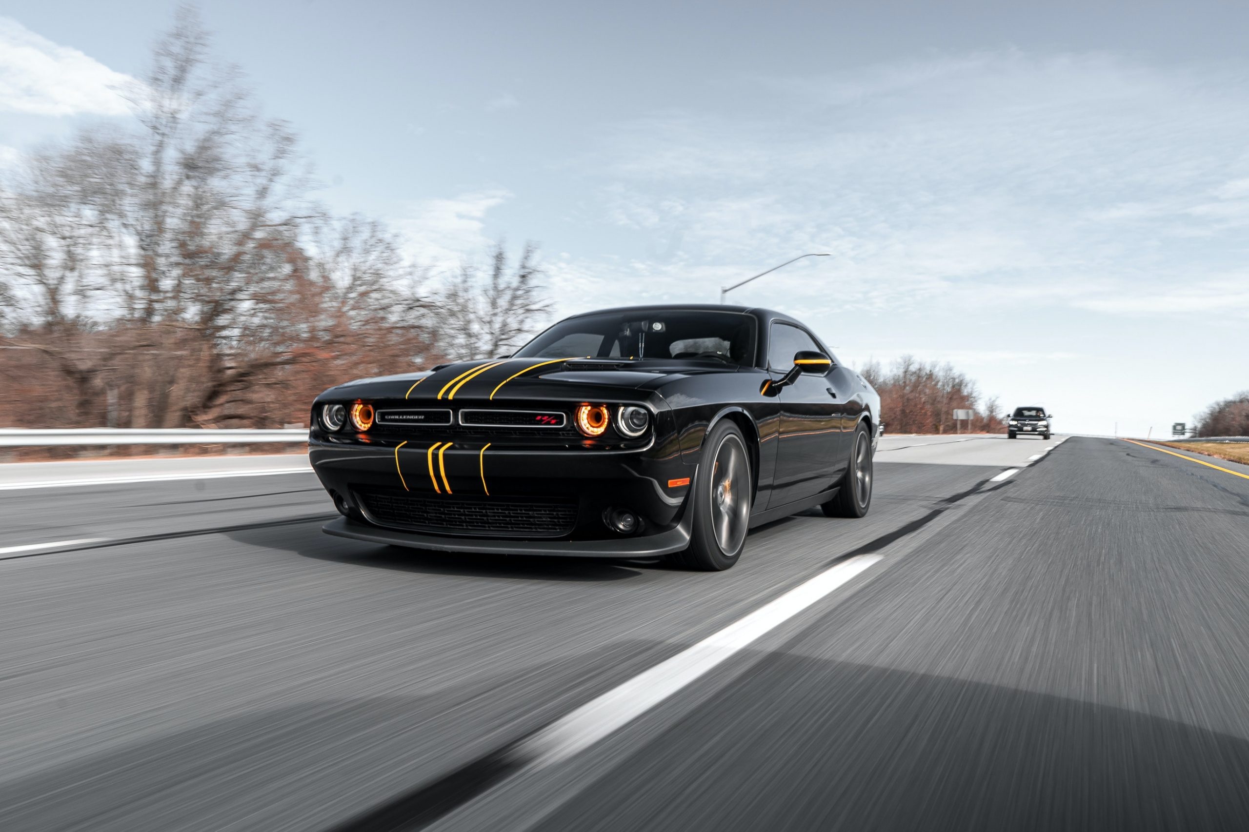 black Dodge Challenger R/T, yellow racing stripes, highway rolling shot, HD Desktop wallpaper