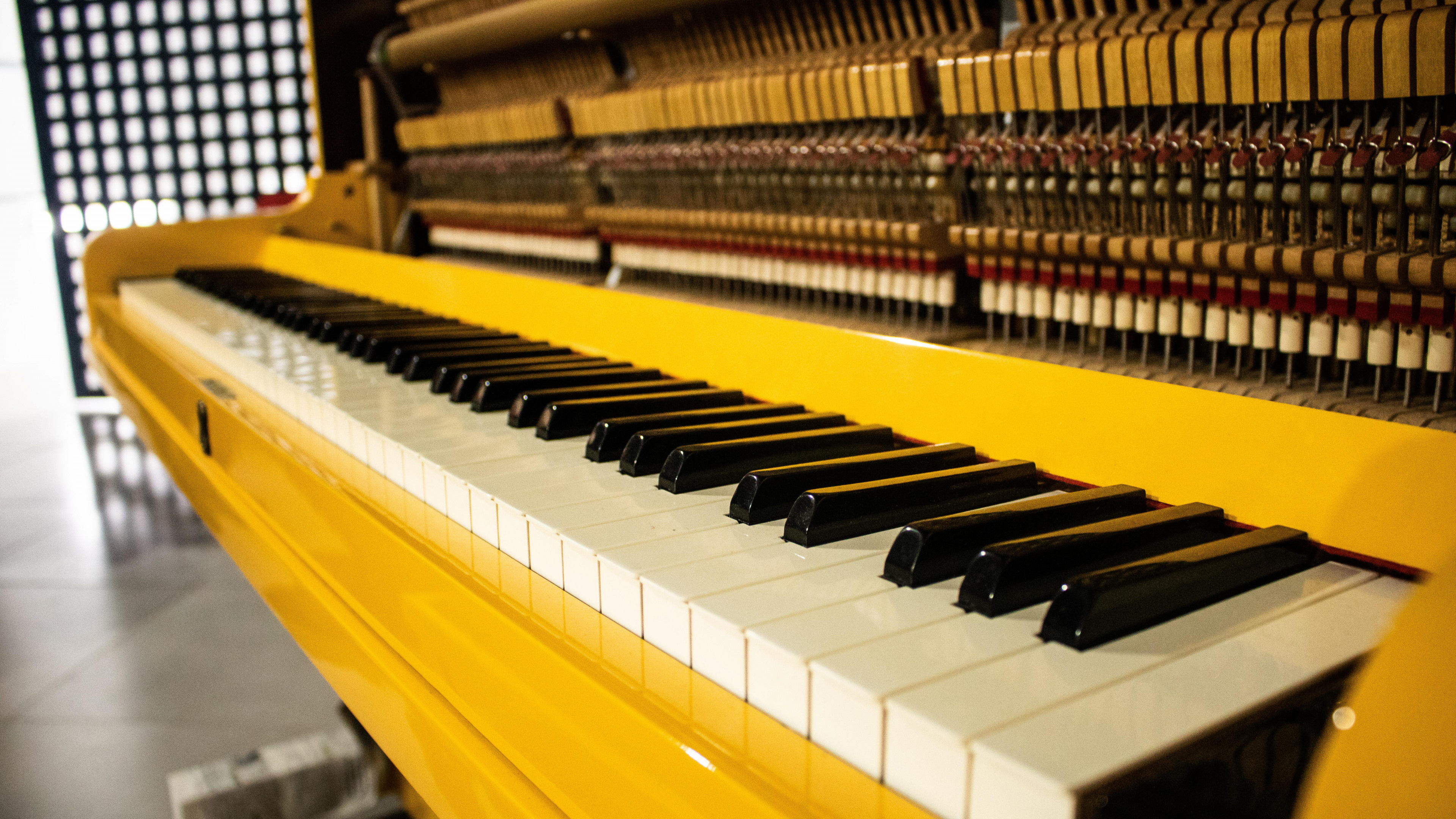 yellow piano keys, vibrant music, widescreen wallpaper, uplifting vibes, 3840x2160 4K Desktop