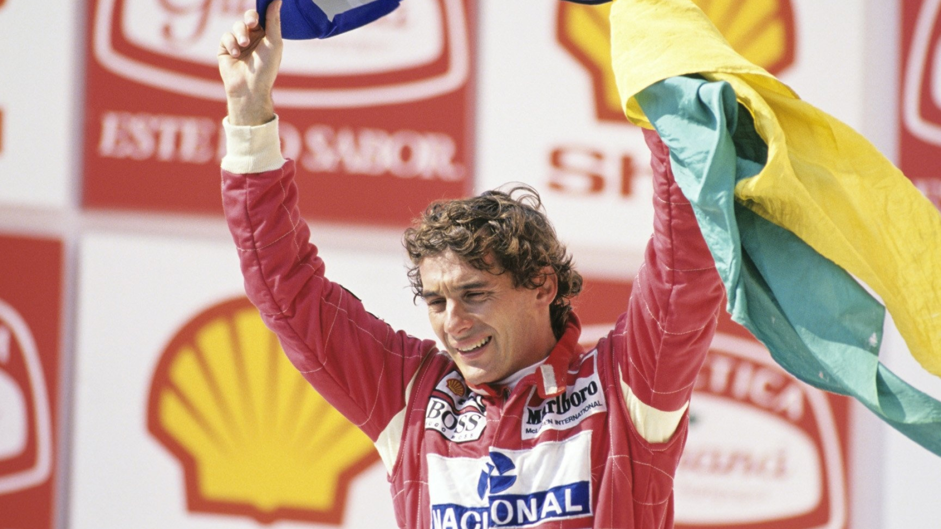 Ayrton Senna, McLaren Marlboro racing suit, Brazilian flag, Full HD Desktop wallpaper