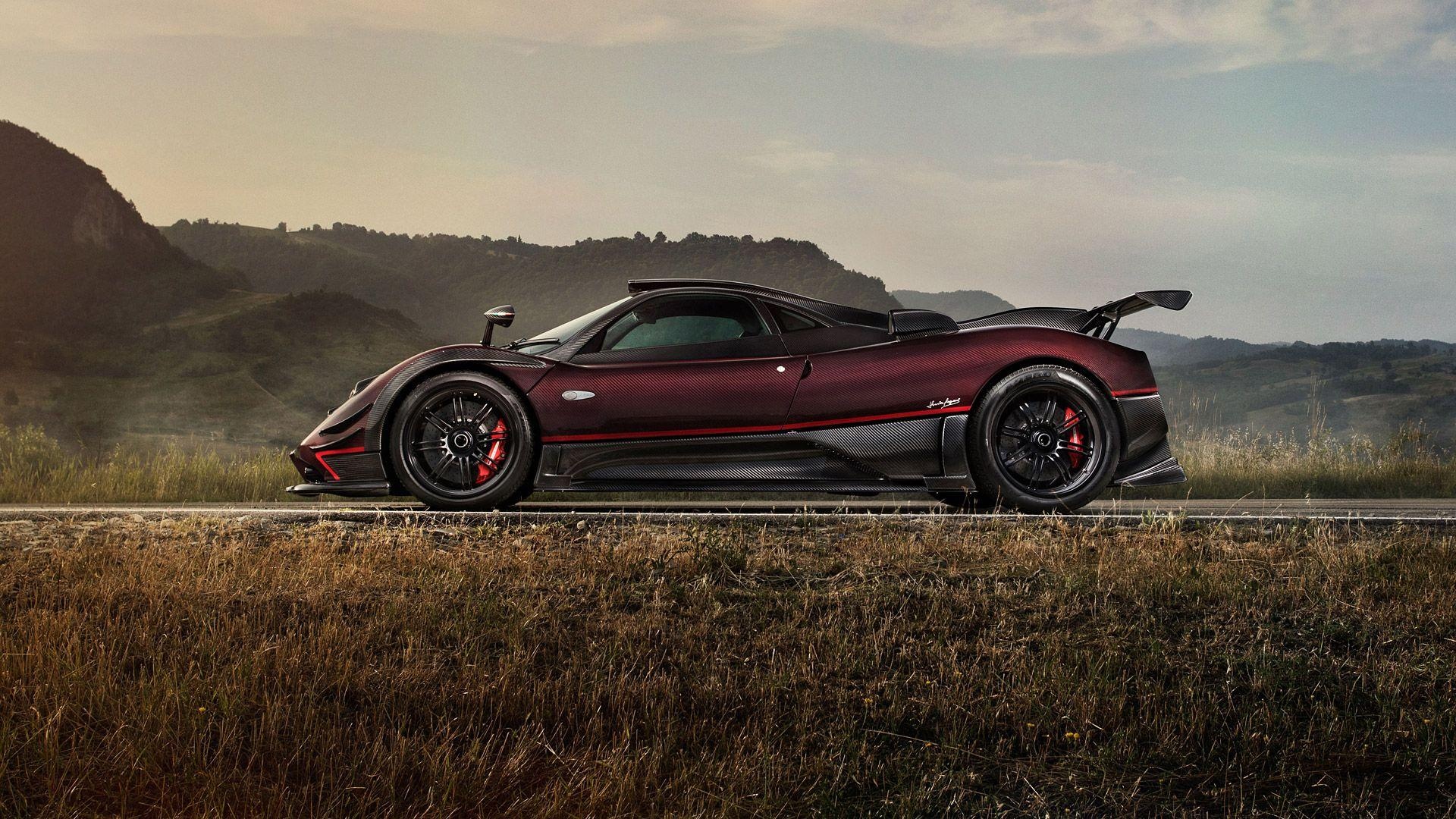 Pagani Zonda Fantasma Evo, red carbon fiber bodywork, countryside mountain road, Full HD Desktop wallpaper