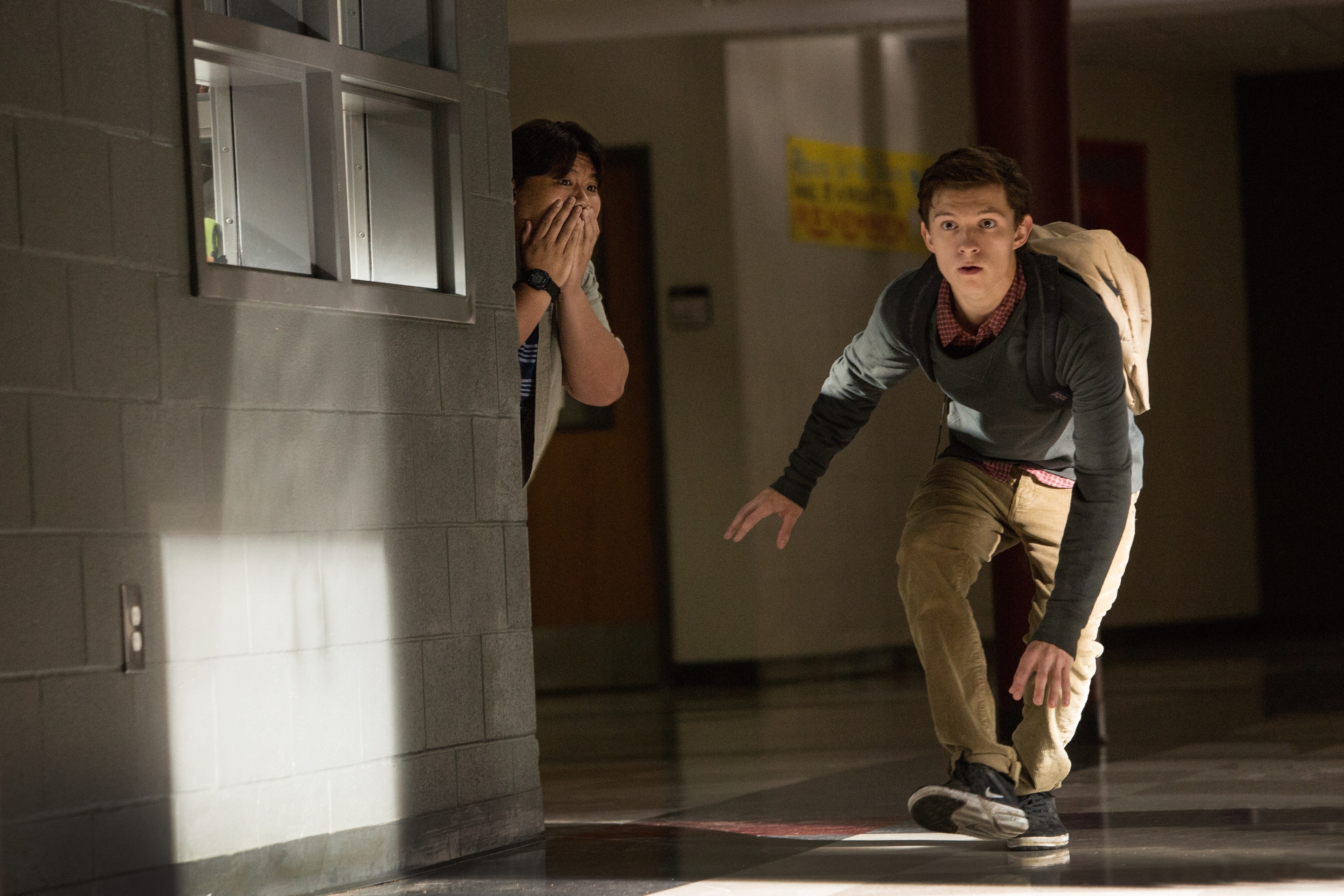Homecoming, Ned Leeds, Sneaking around corner, Dim school hallway, Casual backpack and sweater, Sunlit tiled corridor, 4K Desktop wallpaper