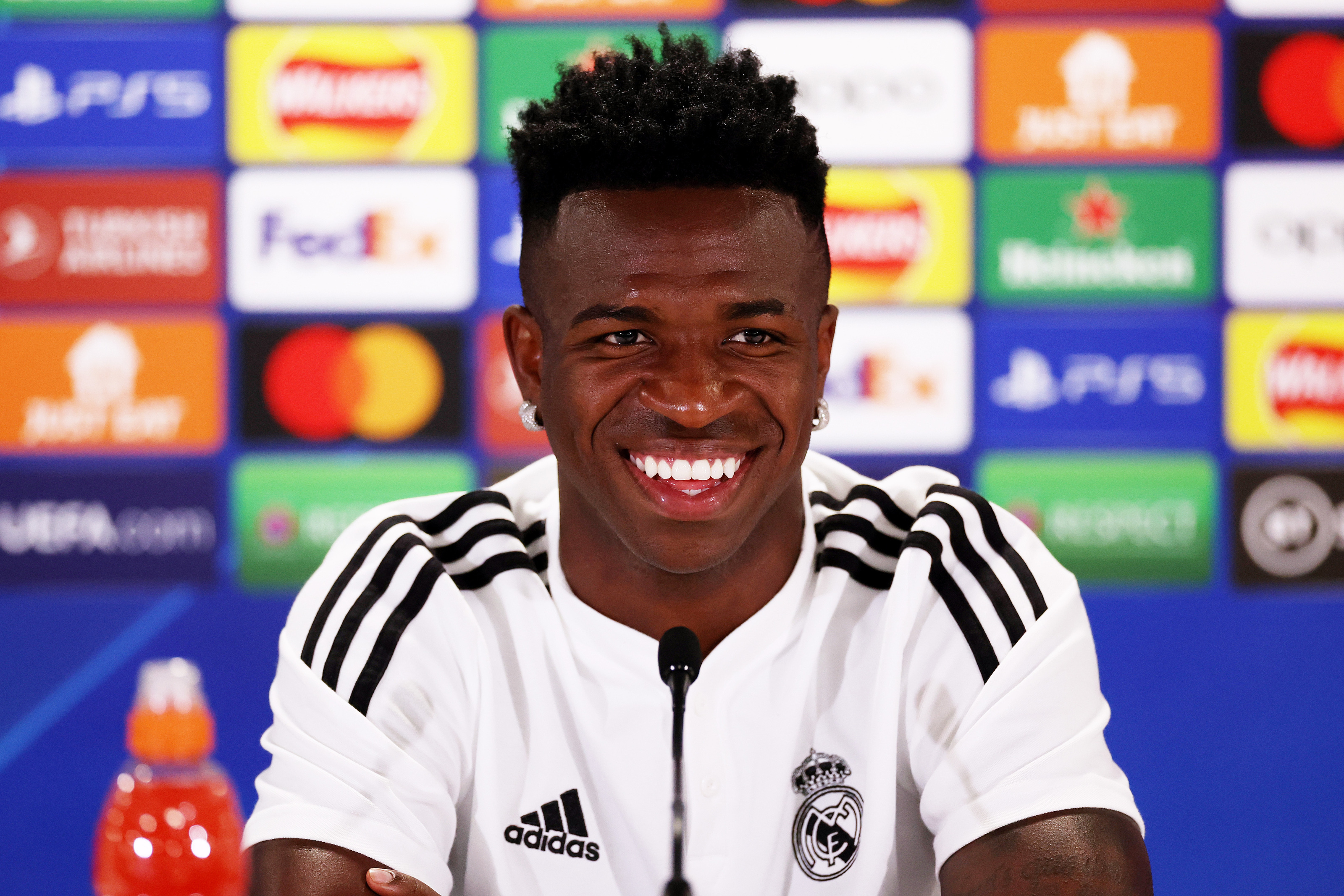 Vinicius Junior, Real Madrid CF polo shirt, UEFA press conference backdrop, HD Desktop wallpaper