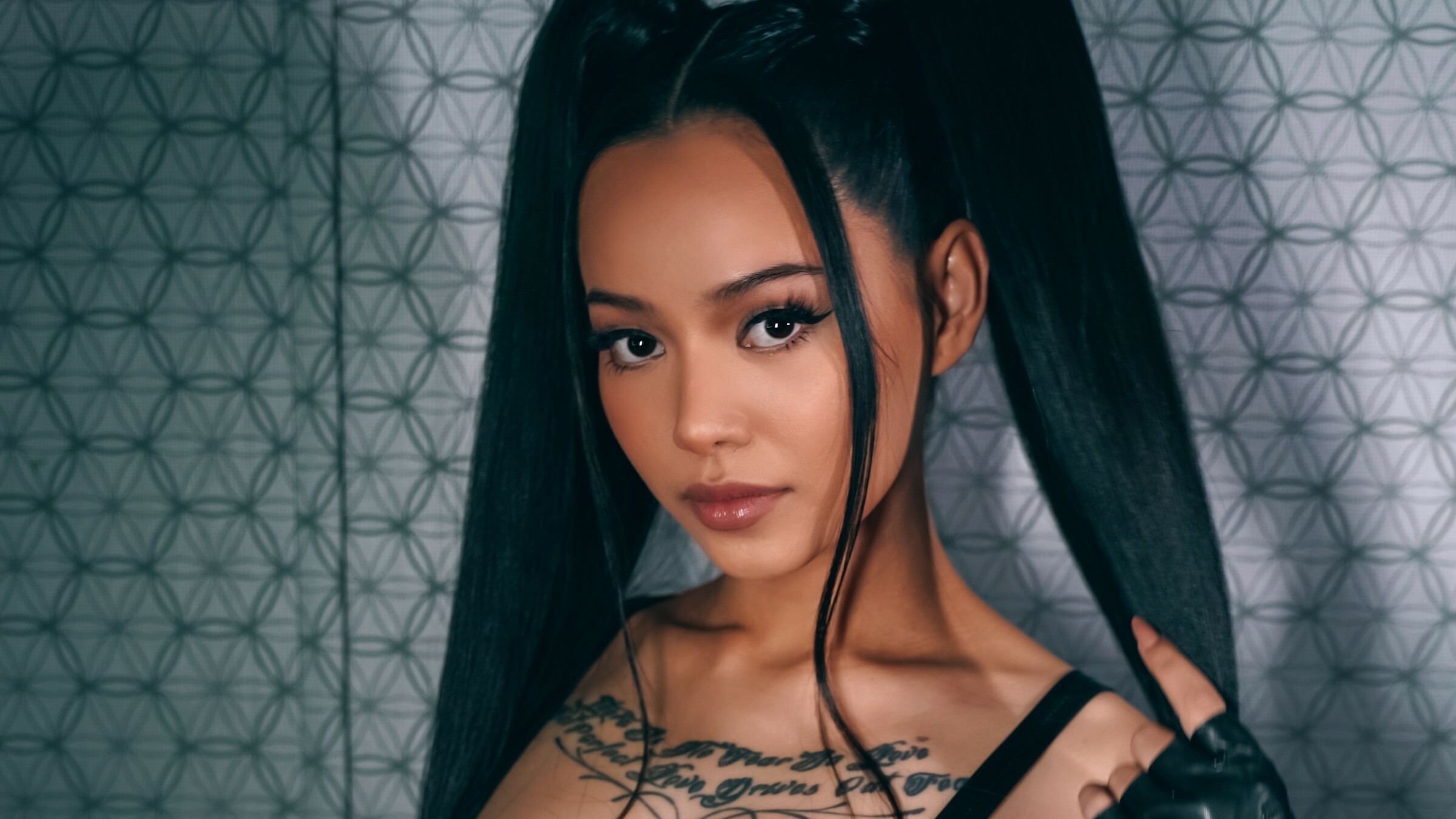 Bella Poarch, TikTok star, Controversial tattoo, Rising popularity, 2400x1350 HD Desktop