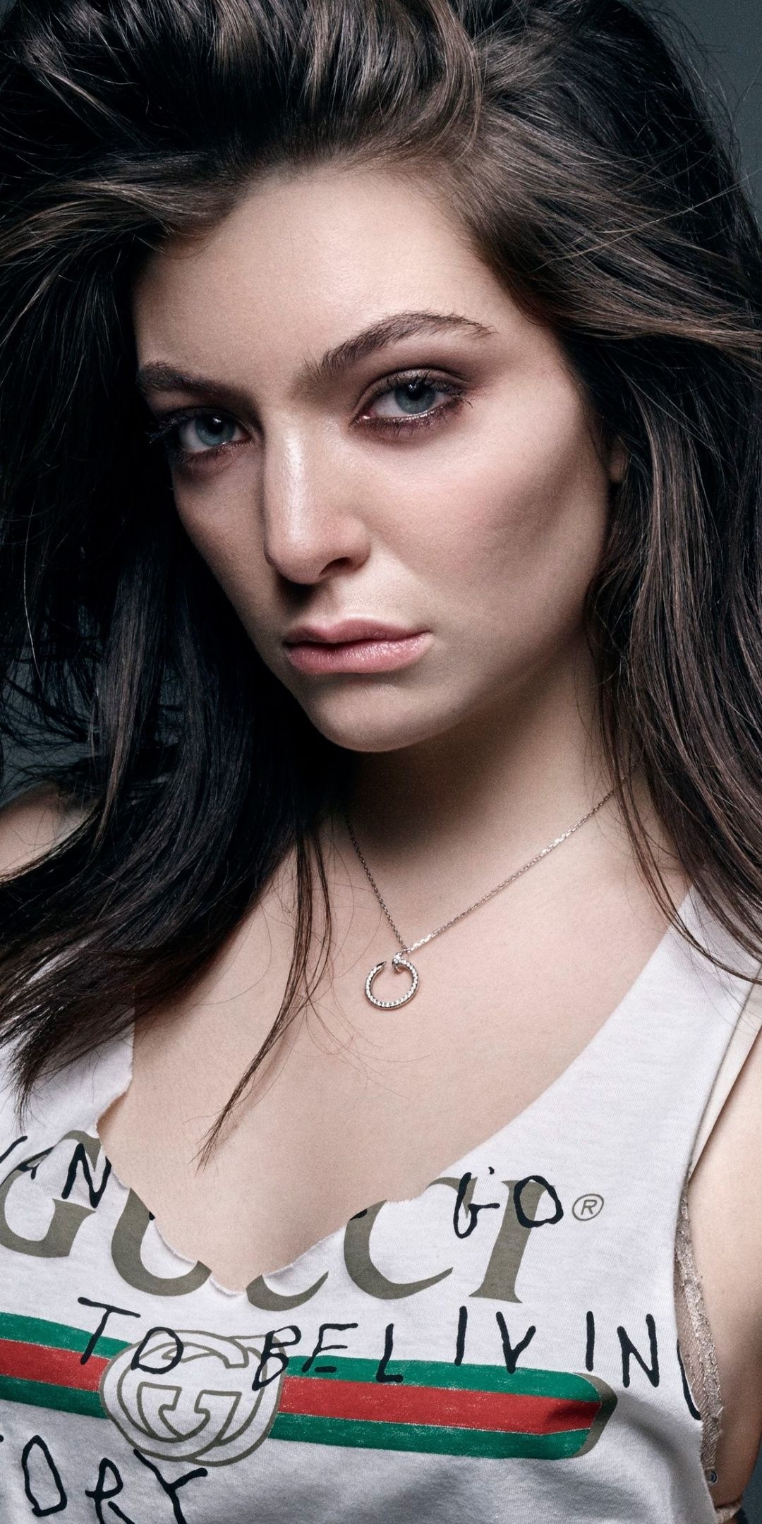 Lorde in black dress, Gorgeous singer, Celebrity wallpapers, Lorde's captivating presence, 1080x2160 HD Phone