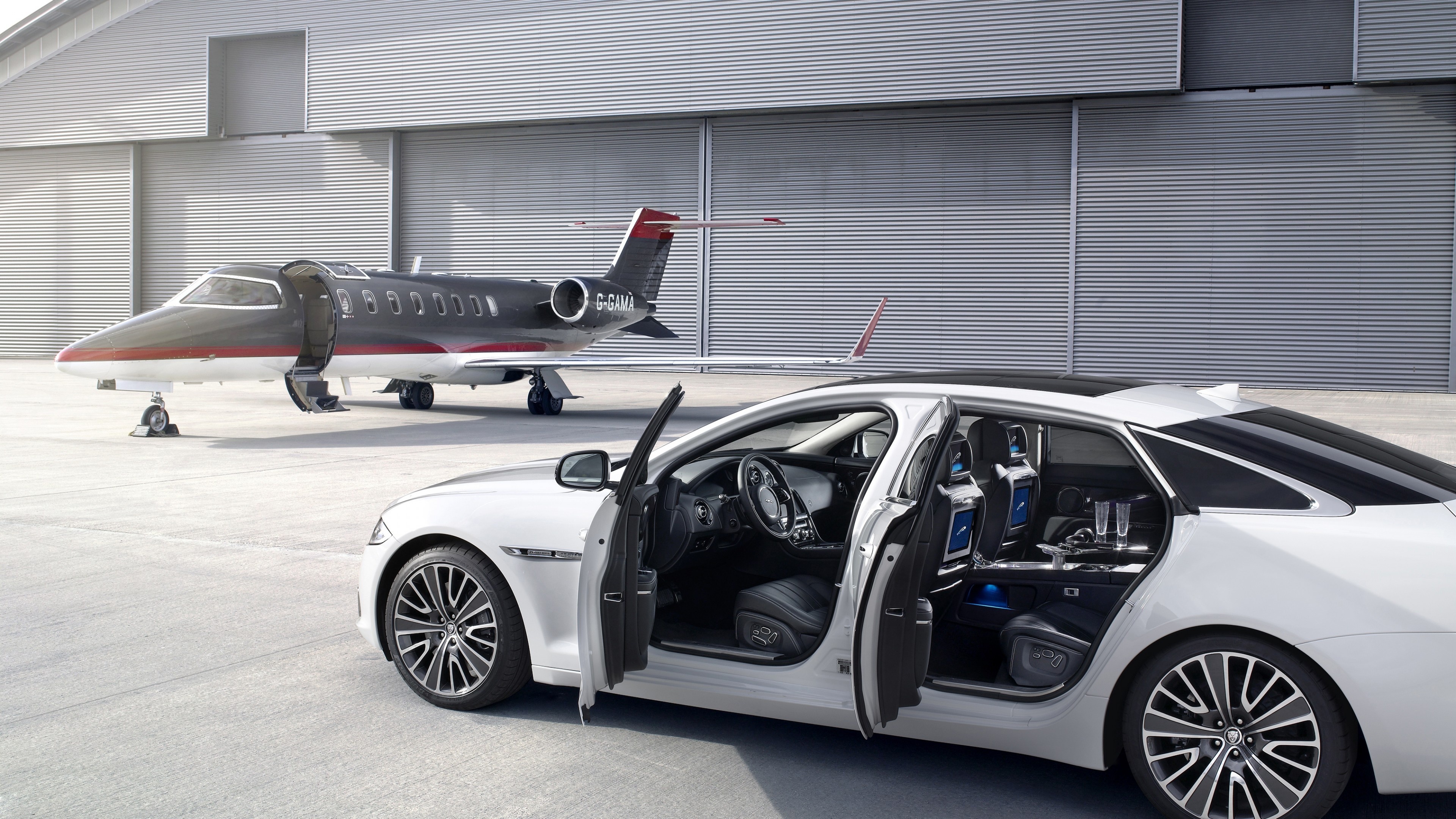 Bombardier Learjet 45, Jaguar XJ luxury sedan, Airport hangar apron, 4K Desktop wallpaper