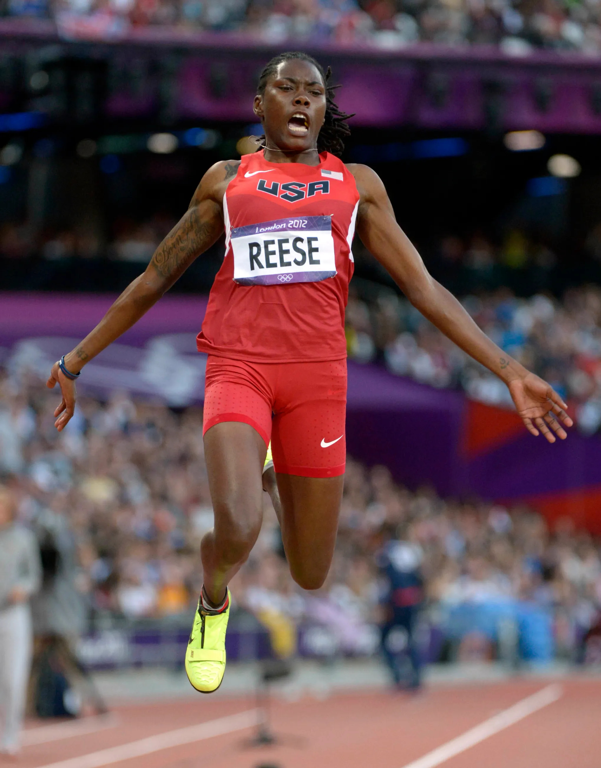 Brittney Reese, Long Jump Wallpaper, 2040x2610 HD Phone