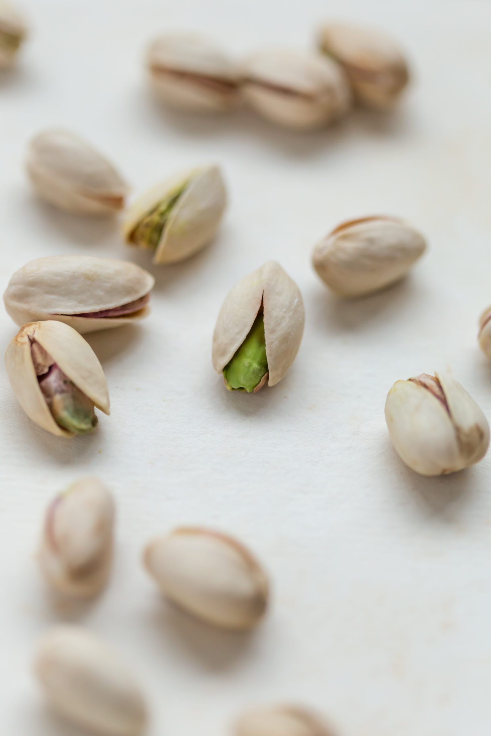 Pistachios scatter jar, Nutty goodness, Snack time, Delicious, 1710x2560 HD Phone