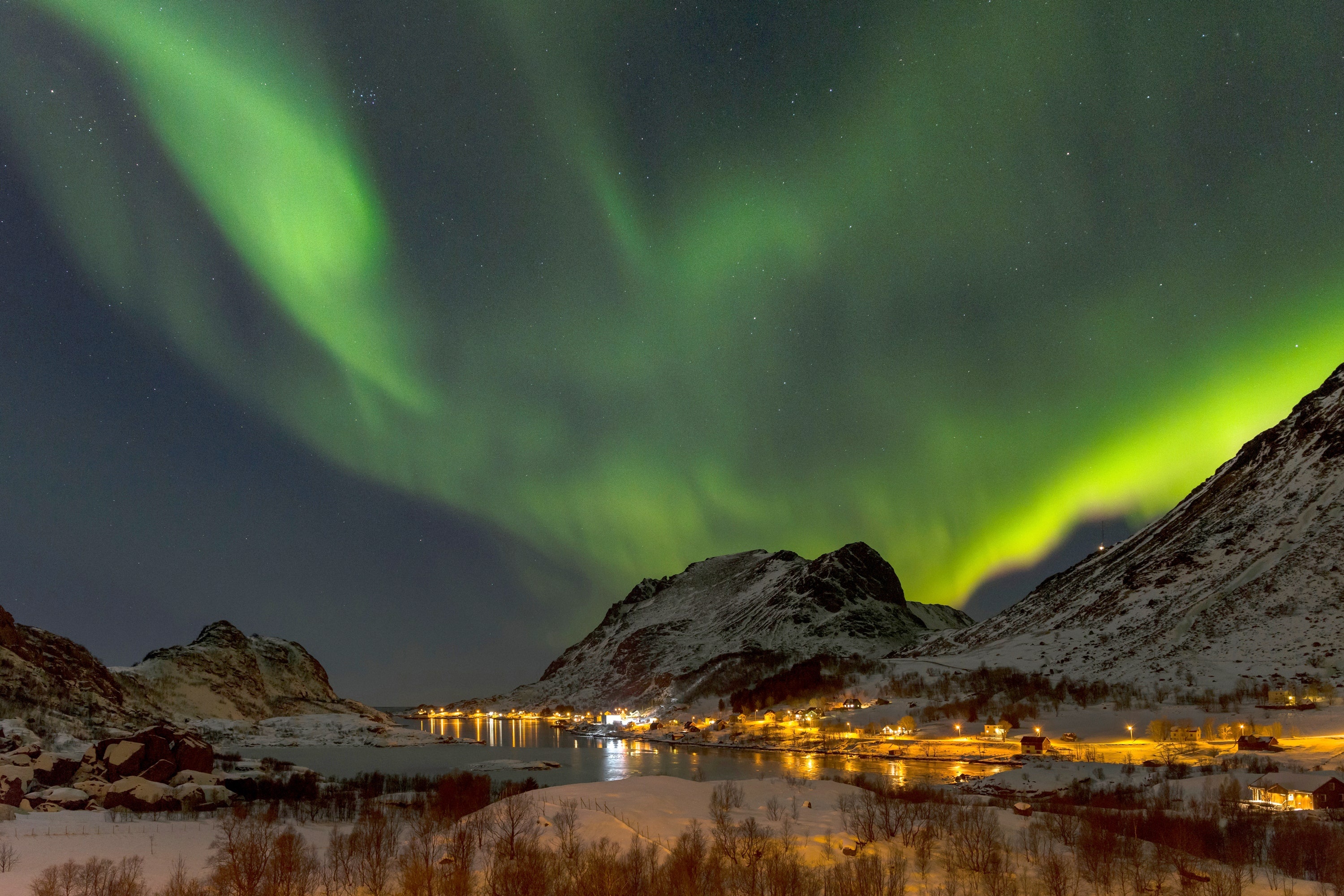 Green Aurora Borealis, Snowy coastal mountain, Illuminated winter village, HD Desktop wallpaper