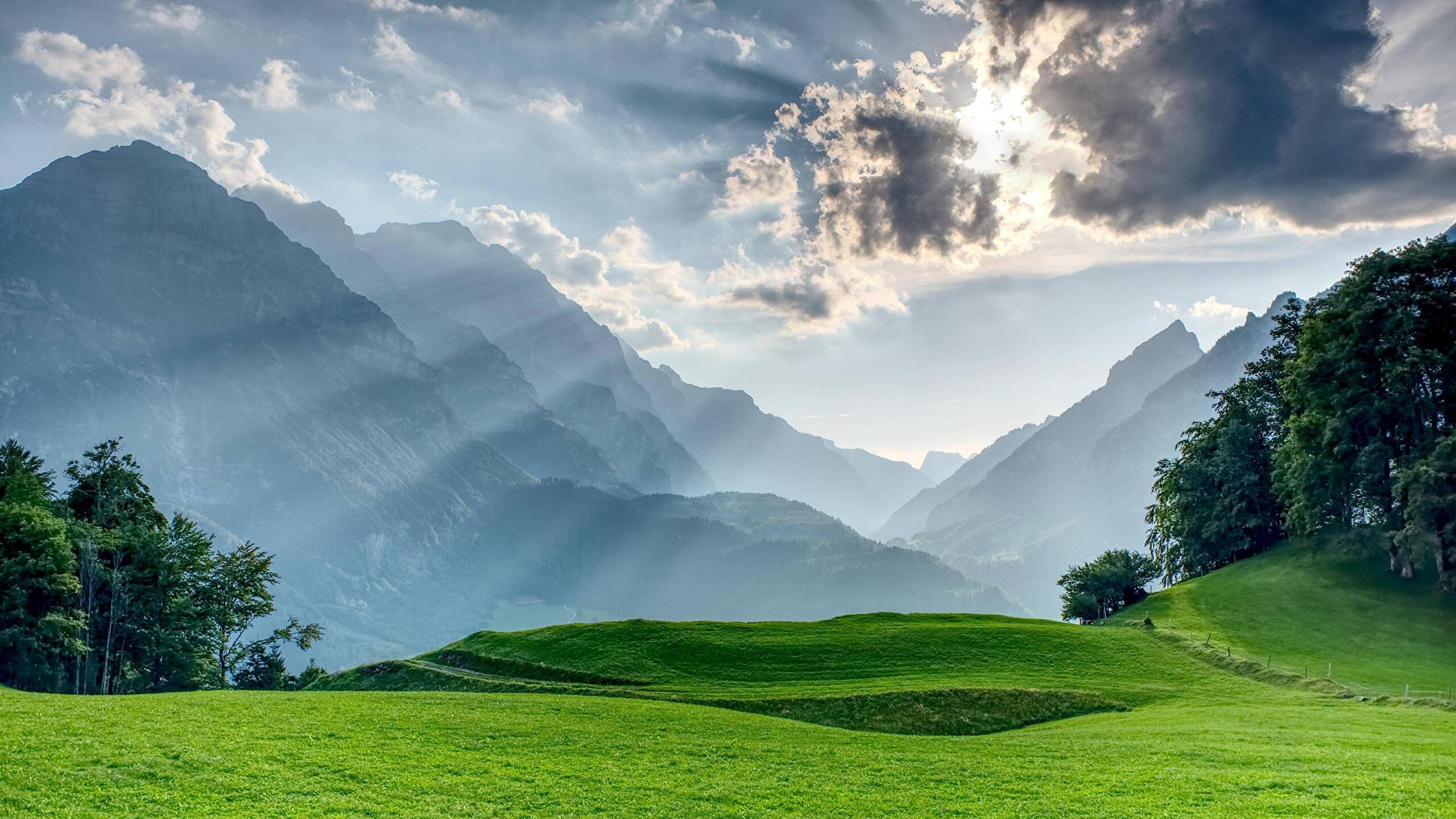 Swiss Alps mountain range, Sunbeams through clouds, Lush green alpine meadow, HD Desktop wallpaper
