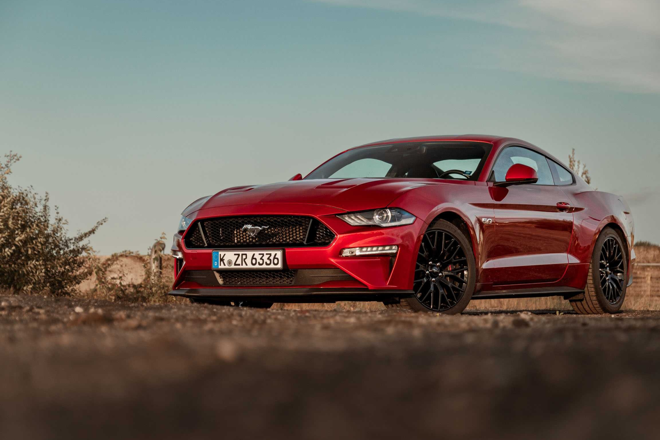 Ford Mustang GT Fastback, Black multi-spoke wheels, Golden hour dirt track, HD Desktop wallpaper