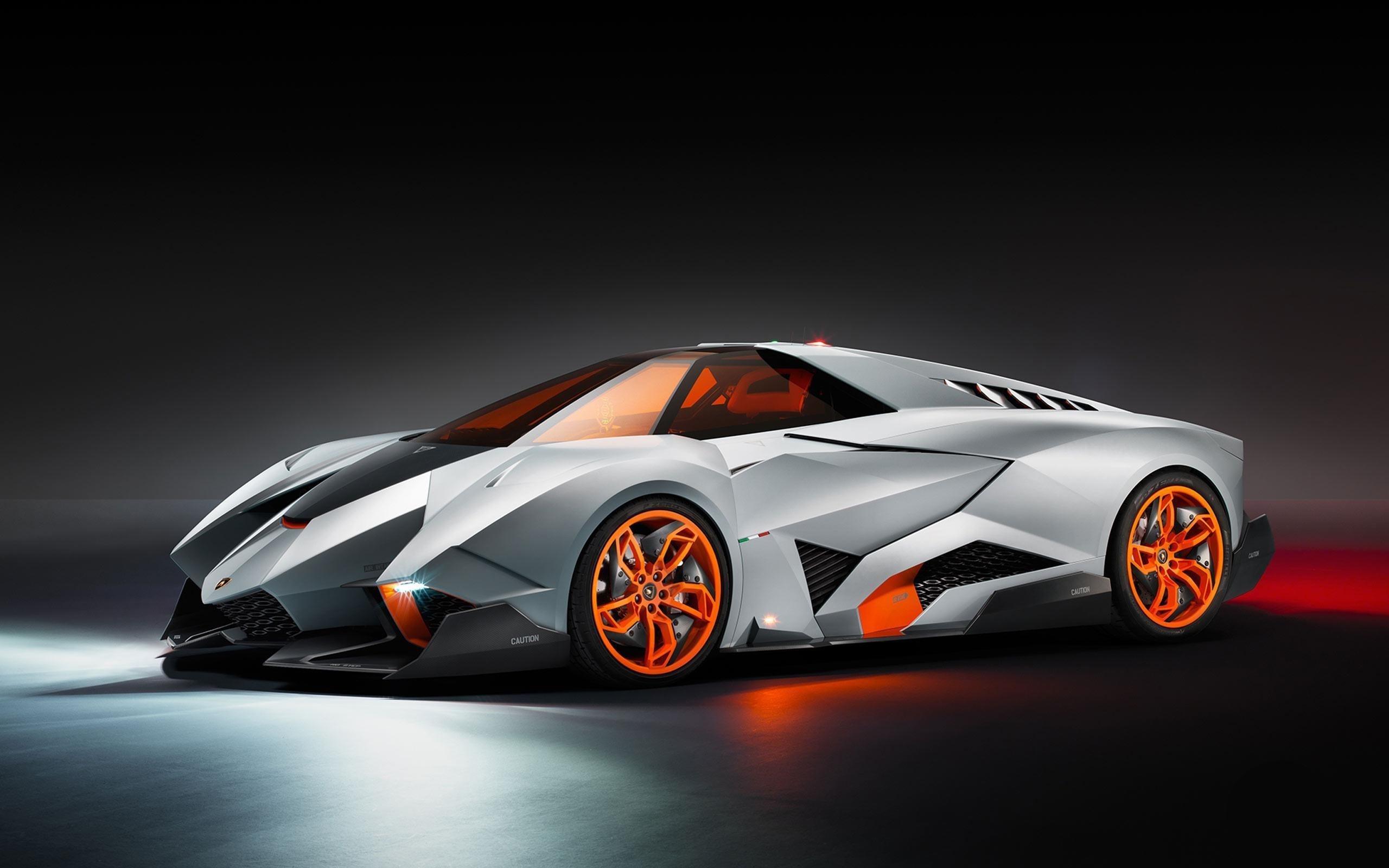 Lamborghini Egoista, orange alloy wheels, dark studio lighting, HD Desktop wallpaper