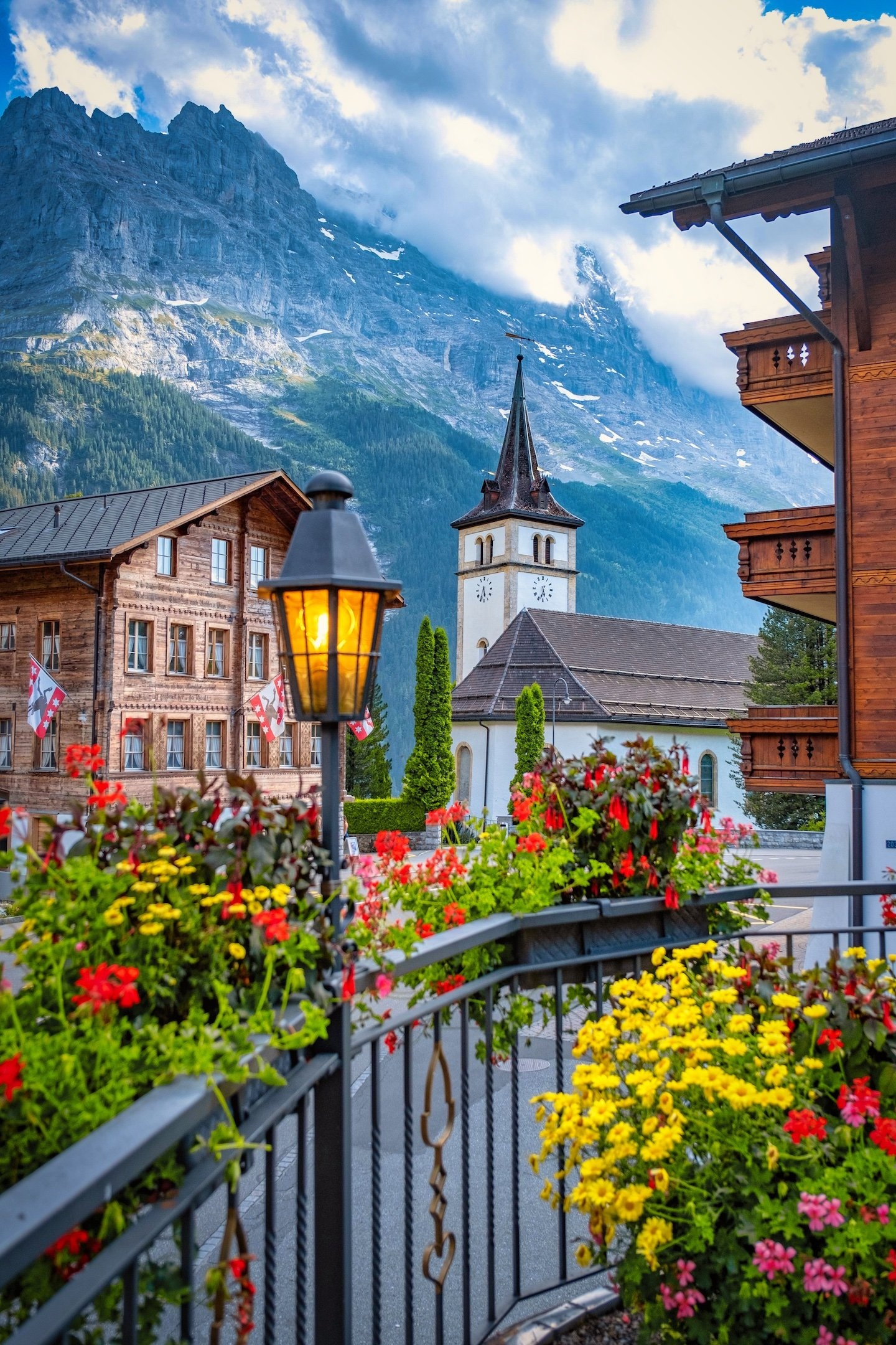 Grindelwald Reformed Church, Bernese Alps mountain, Blooming balcony flower box, HD Phone wallpaper