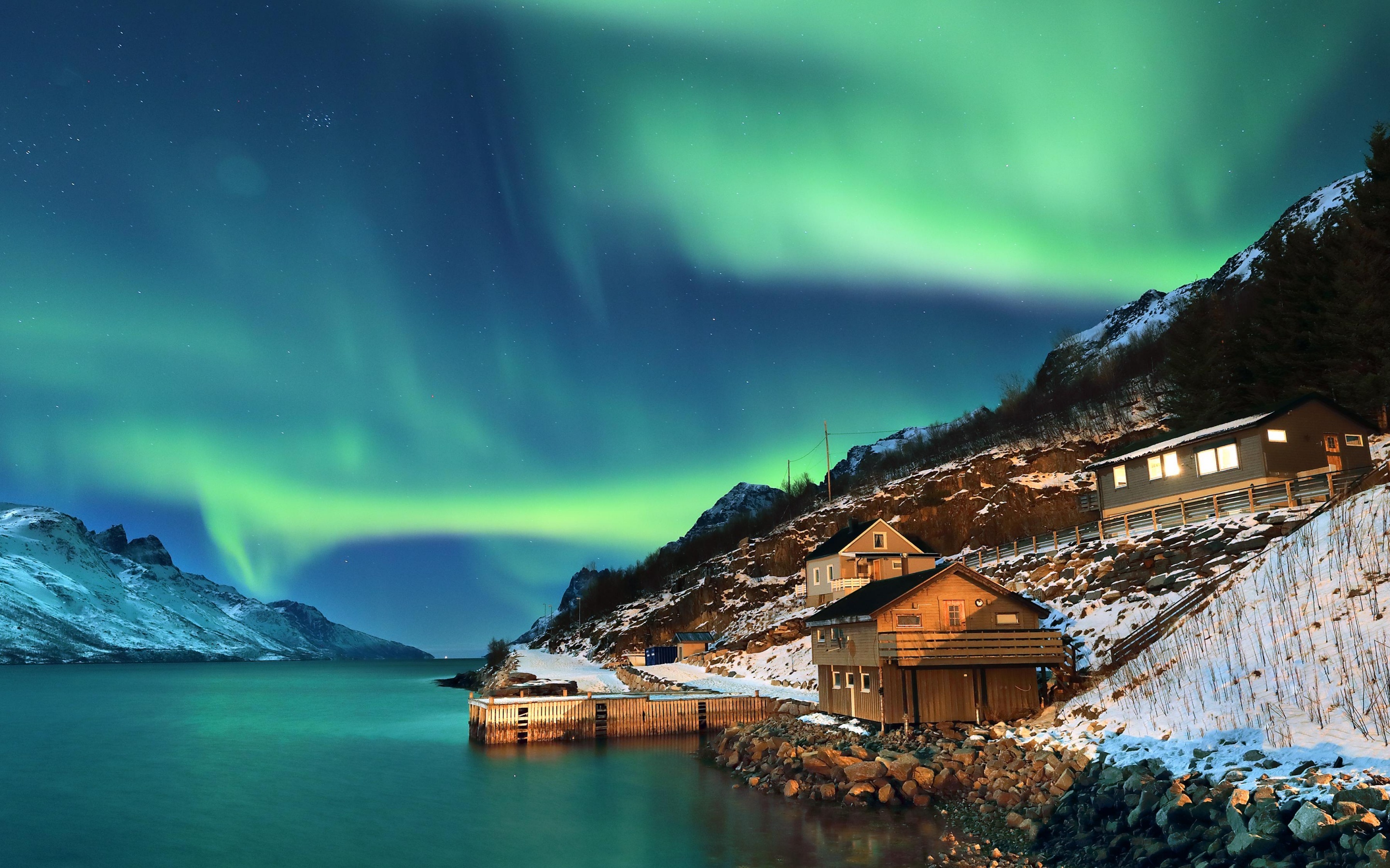 Green Aurora Borealis, Snowy coastal wooden cabins, Arctic fjord shoreline, HD Desktop wallpaper