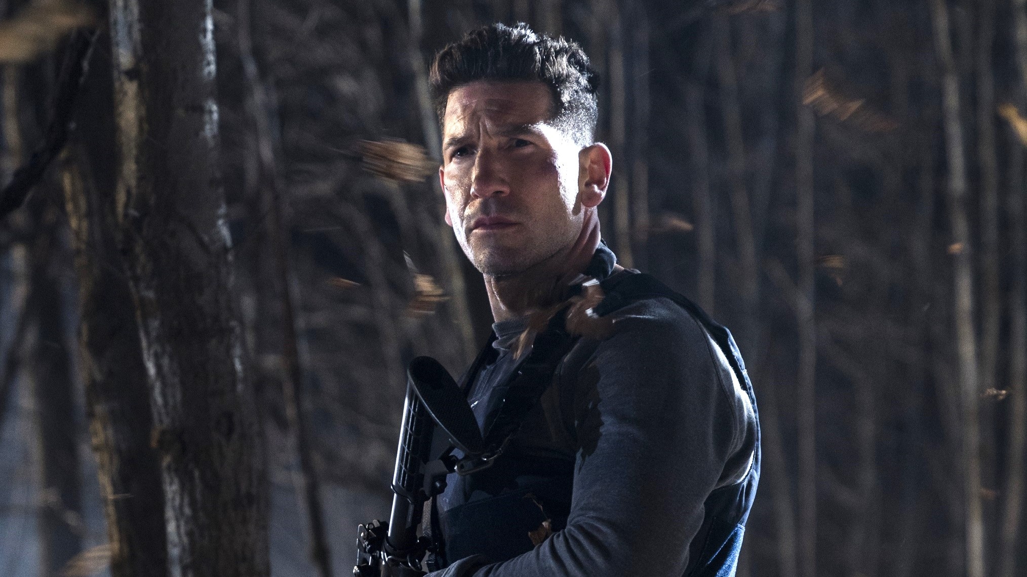 Jon Bernthal as Frank Castle, Tactical vest and rifle, Dark woodland background, HD Desktop wallpaper