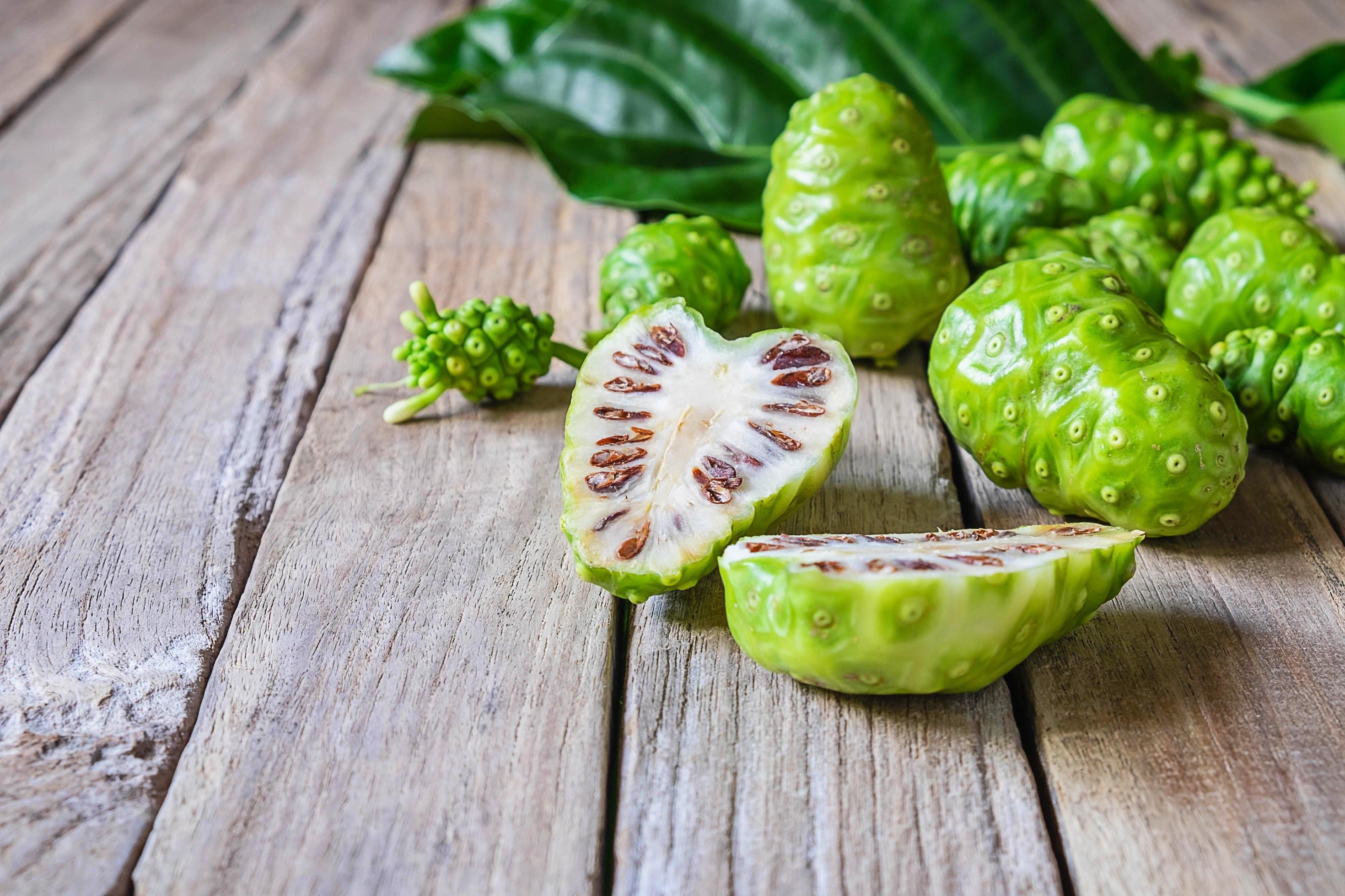 Noni Fruit, Wooden background, Stock photo, Vecteezy, 2940x1960 HD Desktop