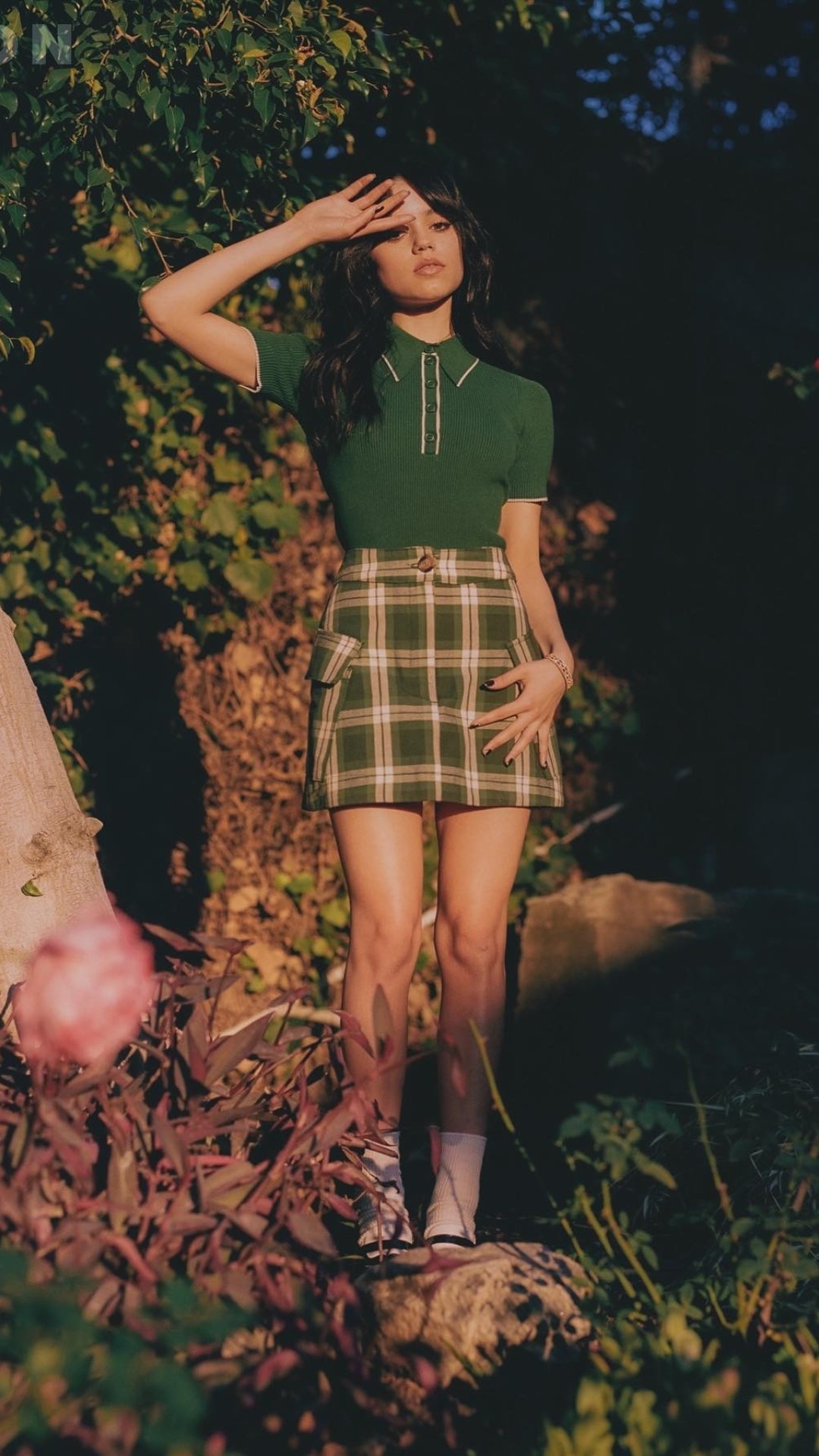 Jenna Ortega, green plaid mini skirt, sunlit garden foliage, Full HD Phone wallpaper