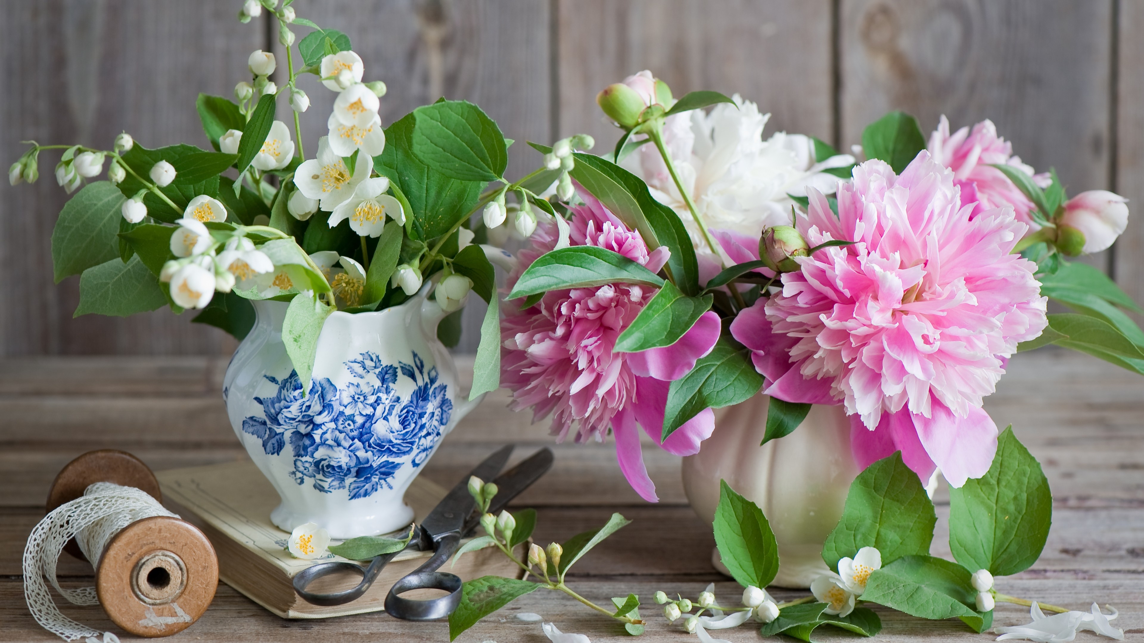 Pink peony blooms, White mock orange blossoms, Blue floral ceramic pitcher, Vintage iron scissors, Rustic wooden boards, 4K Desktop wallpaper