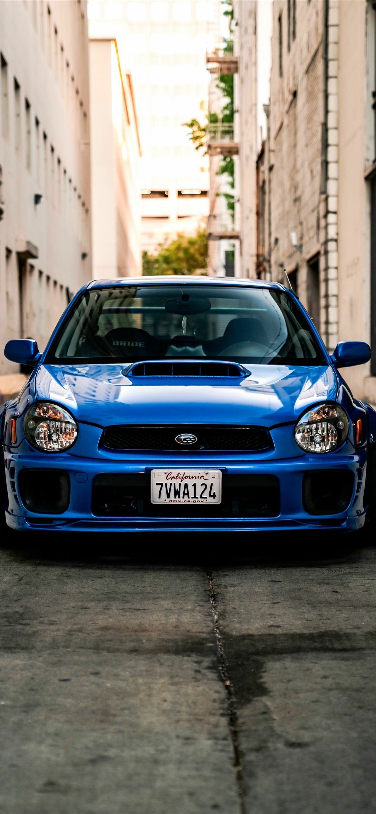 Subaru STI iPhone, Luxury car wallpapers, Elegant design, High-performance, 1290x2780 HD Phone