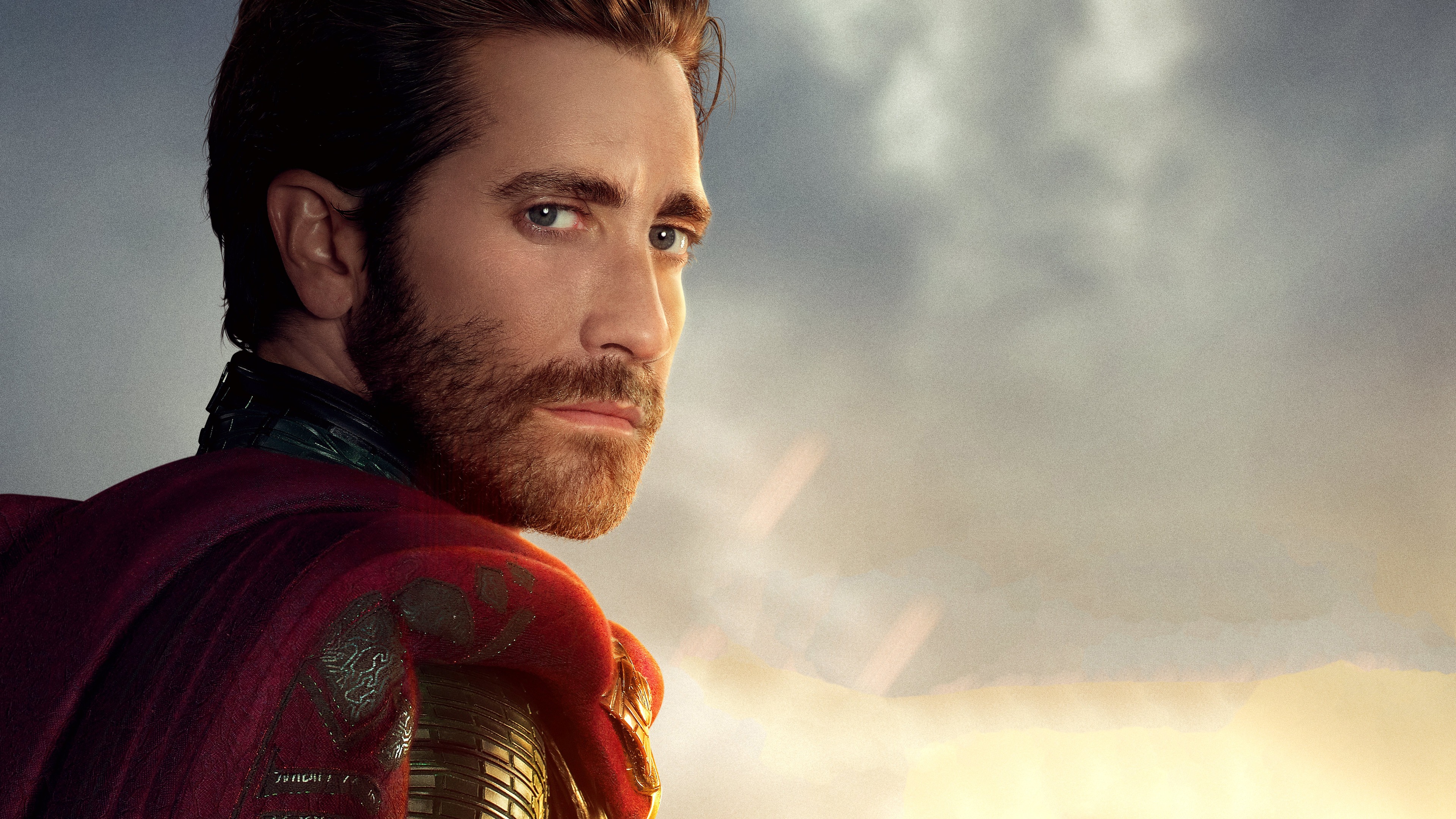 Far From Home, Mysterio, Jake Gyllenhaal, Looking over shoulder, Embroidered red cape, Hazy smoky sky, Golden glowing atmosphere, 4K Desktop wallpaper
