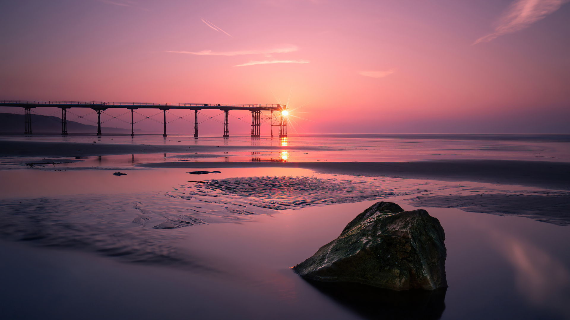 Saltburn Pier, Wet sandy beach reflection, Pink sunset sunburst, Full HD Desktop wallpaper