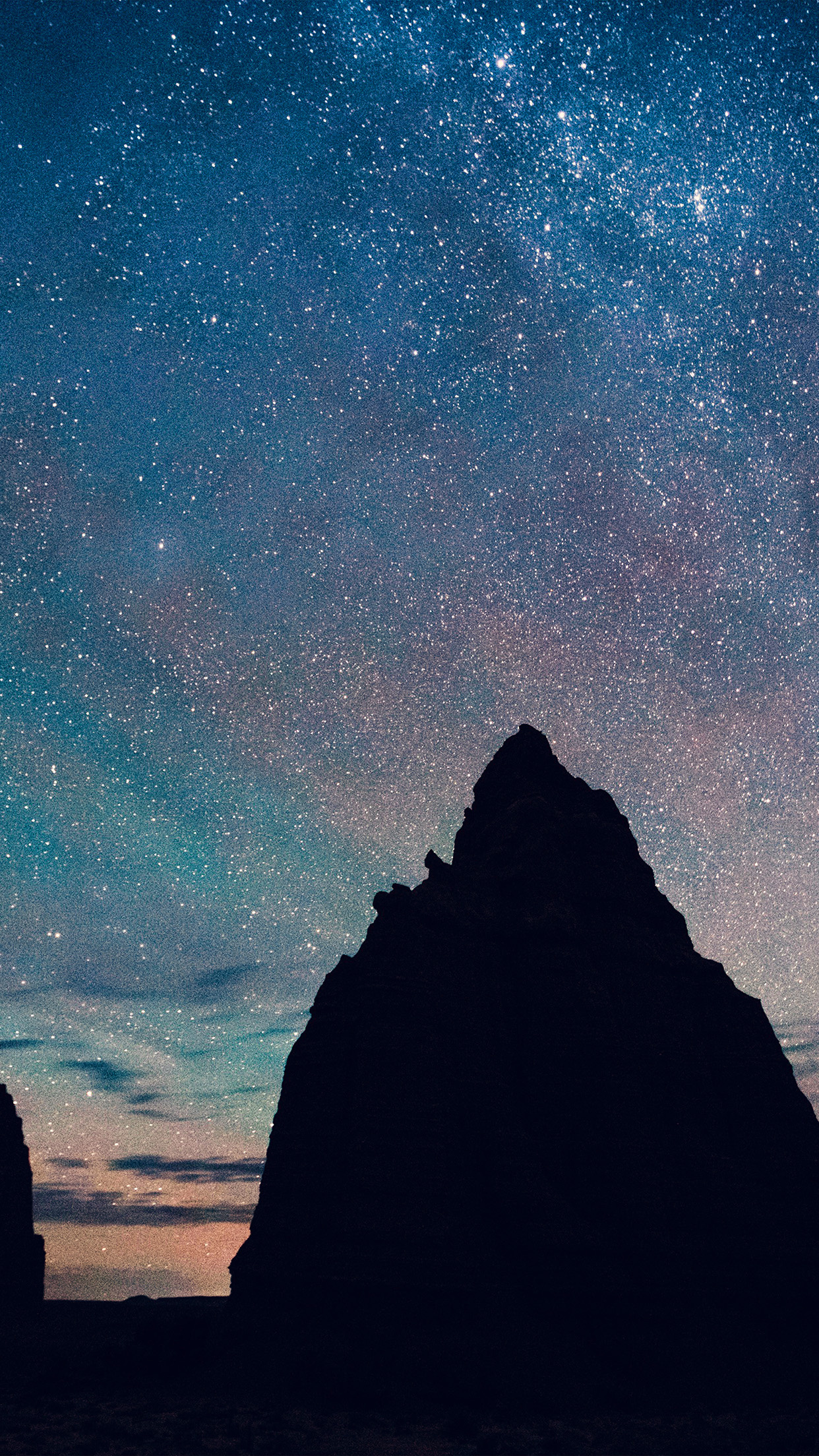 sandstone butte silhouette, dense starry night sky, twilight horizon glow, HD Phone wallpaper
