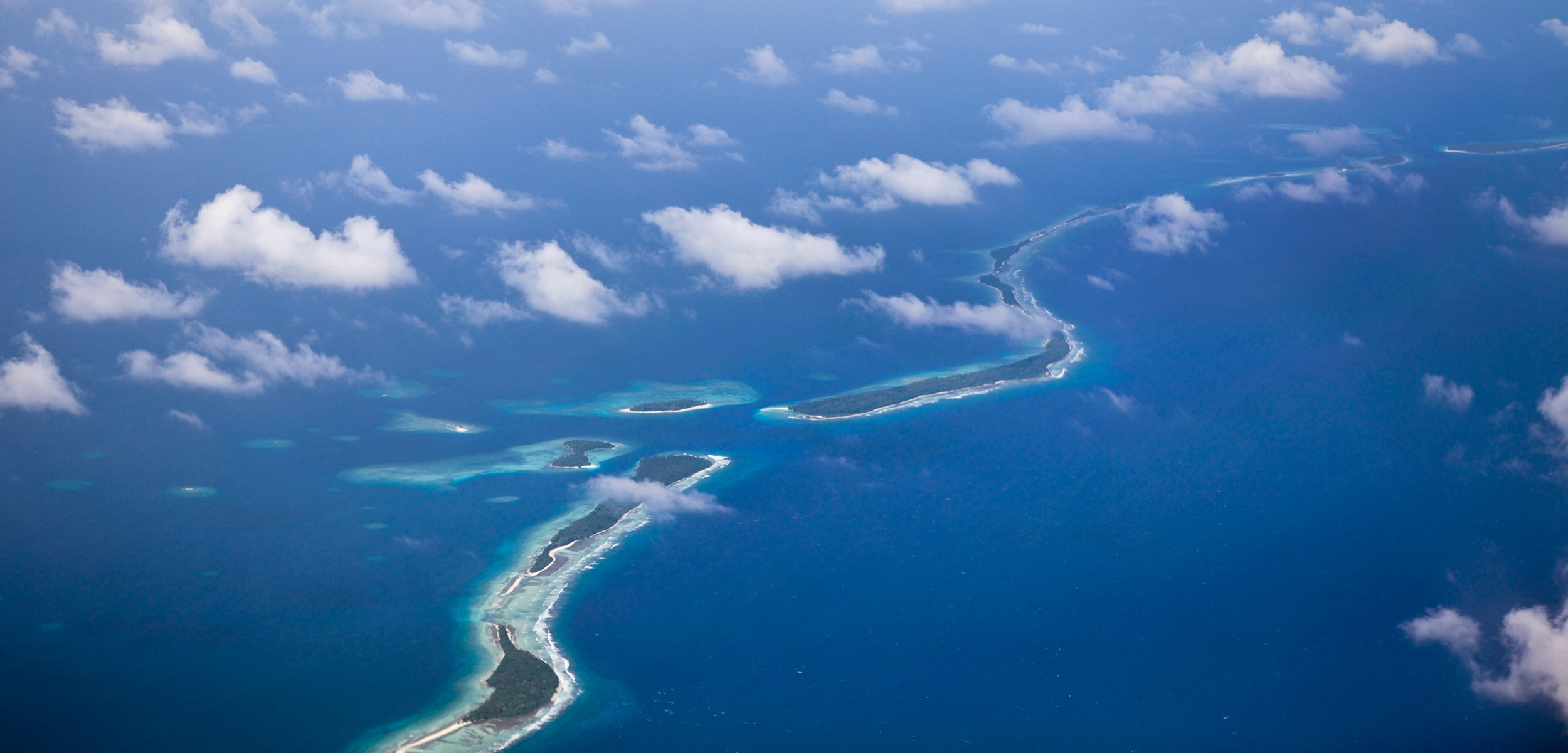 Landlocked islanders in Marshall Islands, Unique challenges, Remote connectivity, Cultural preservation, 2500x1210 Dual Screen Desktop