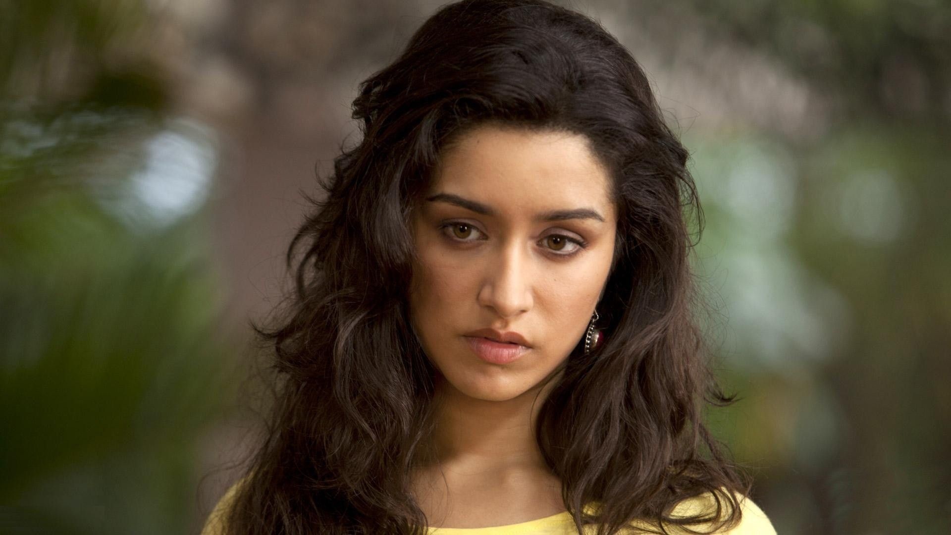 Shraddha Kapoor, yellow scoop-neck top, blurred foliage background, Full HD Desktop wallpaper