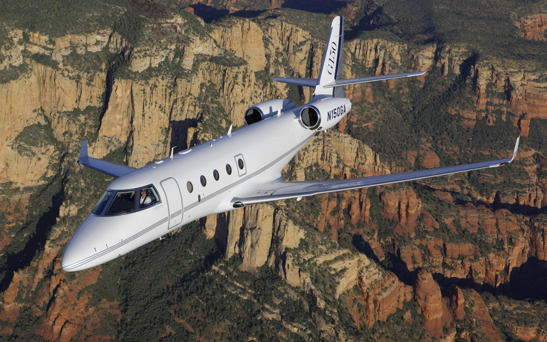 Gulfstream G150, Red rock canyon landscape, Business jet in flight, HD Desktop wallpaper