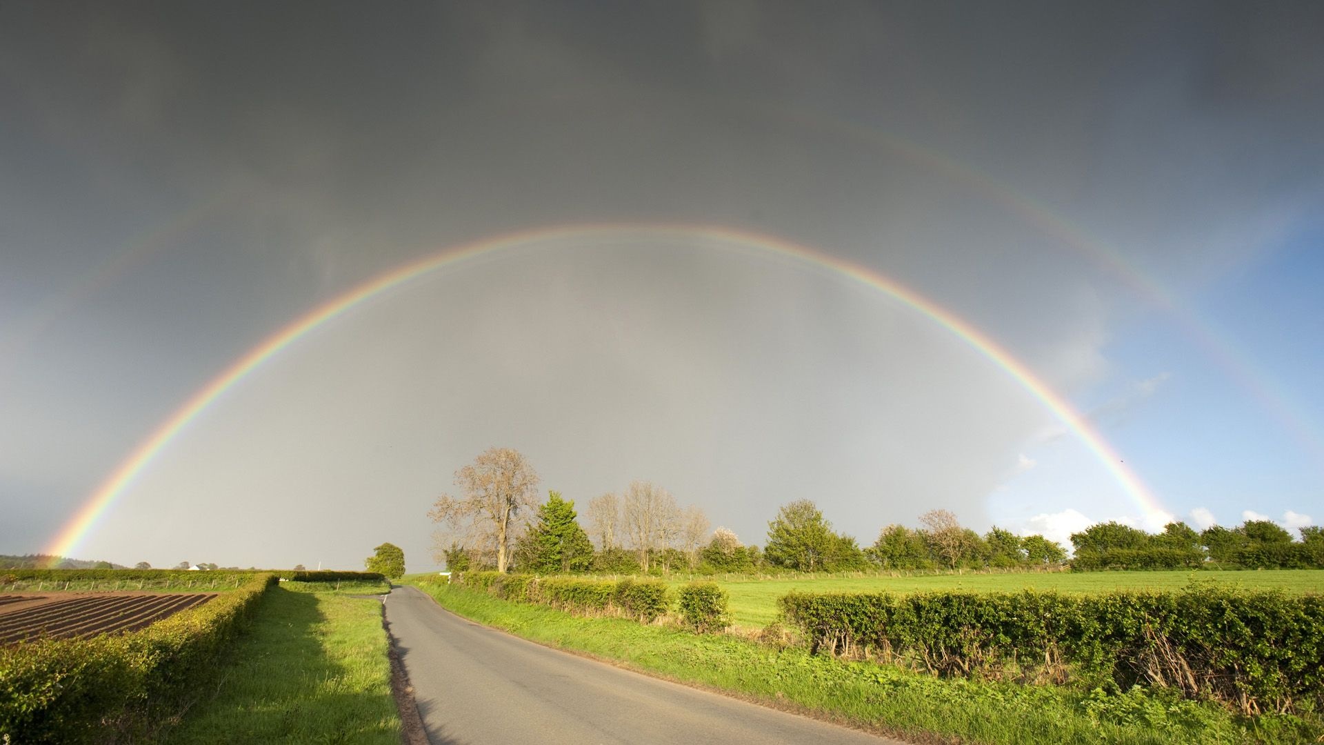 Full double rainbow, Paved rural road, Green farmland hedgerows, Full HD Desktop wallpaper