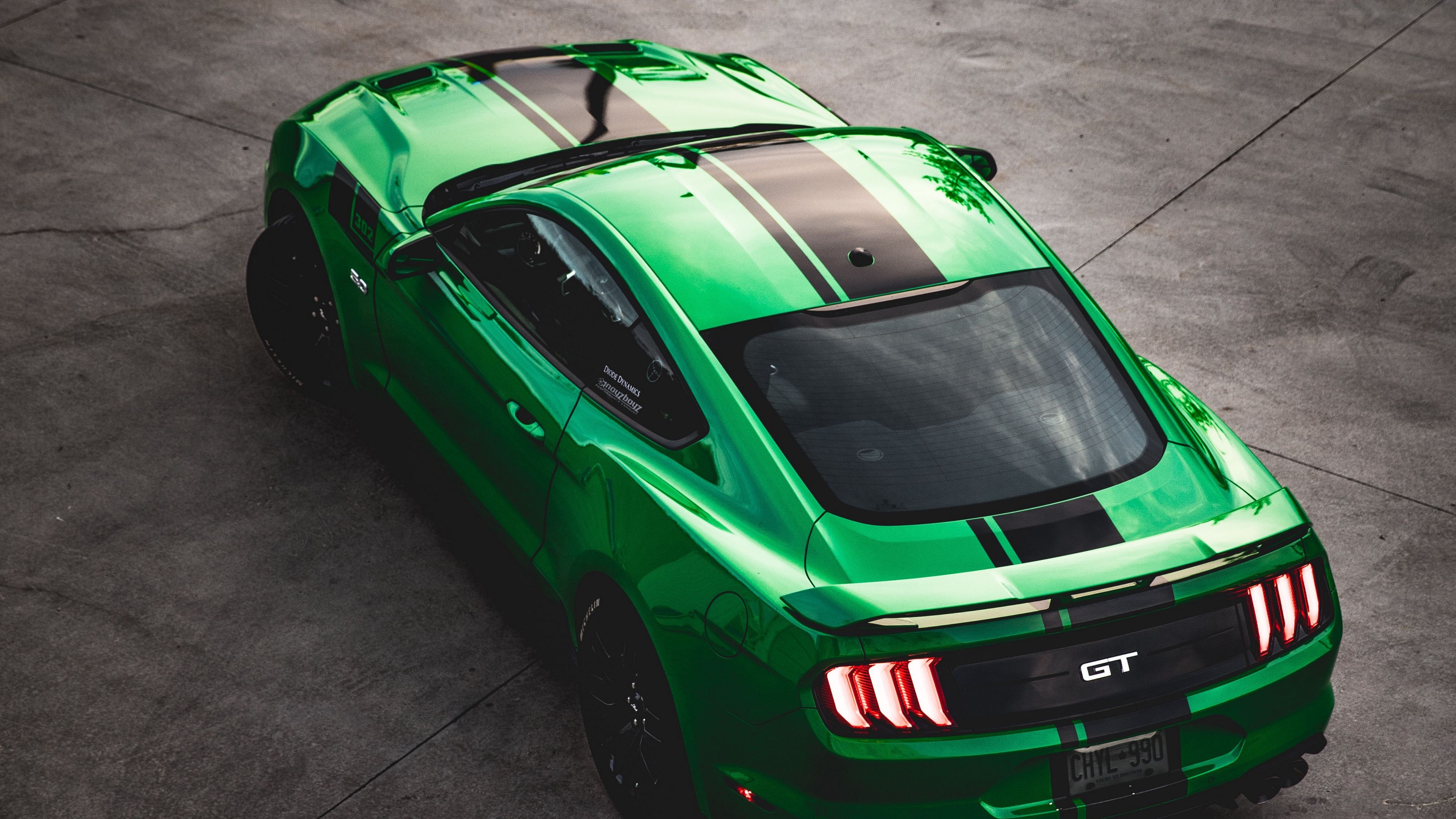 Green Ford Mustang GT, Black racing stripes, Concrete pavement, 4K Desktop wallpaper