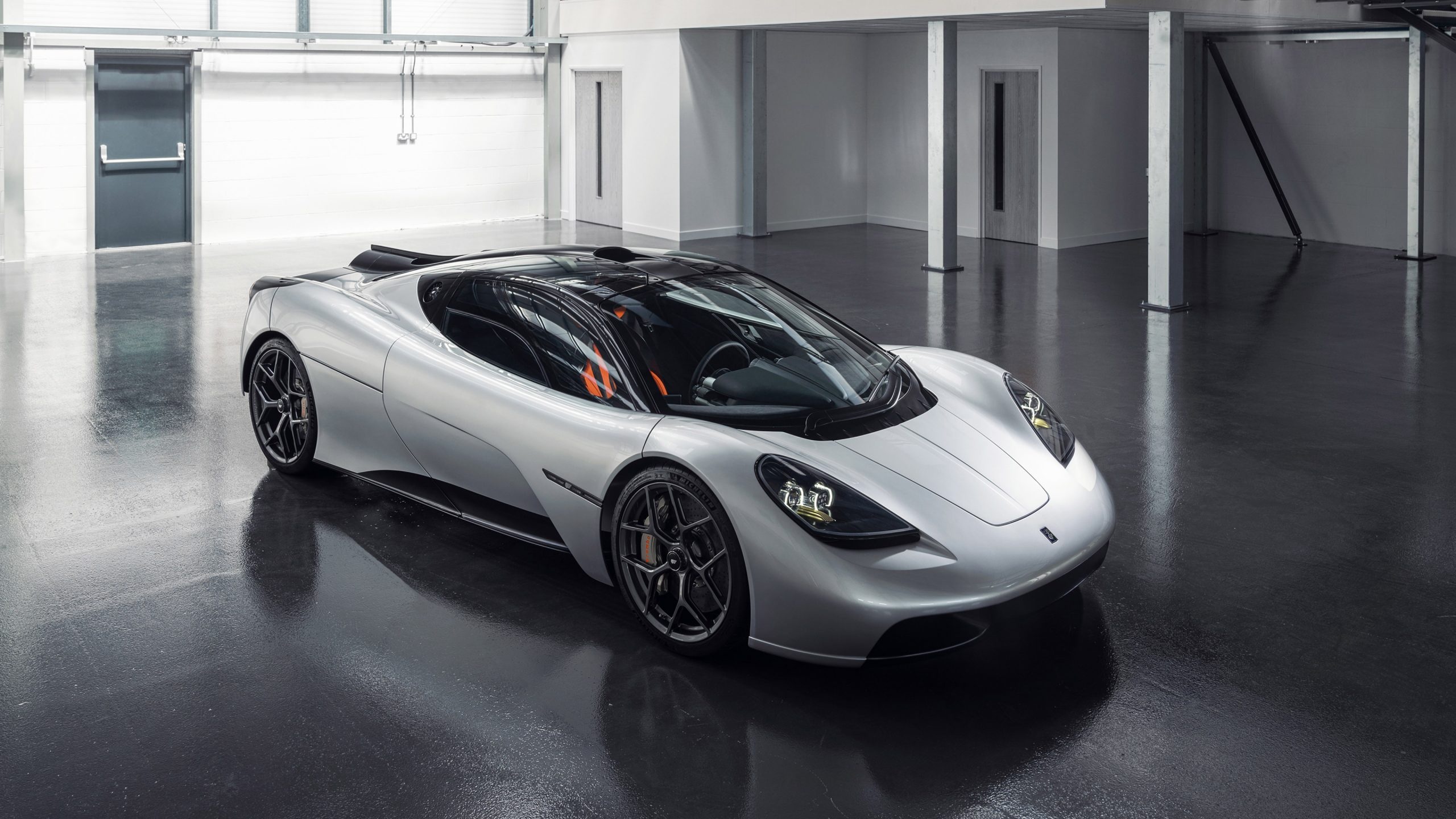 Gordon Murray Automotive T.50, minimalist industrial showroom, reflective polished floor, HD Desktop wallpaper