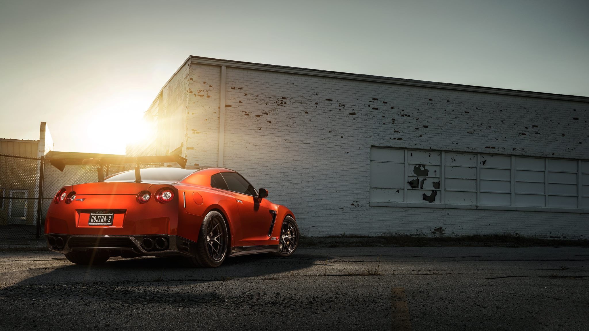 Nissan GT-R, Red sports car, Land vehicle elegance, Automotive allure, 2050x1160 HD Desktop