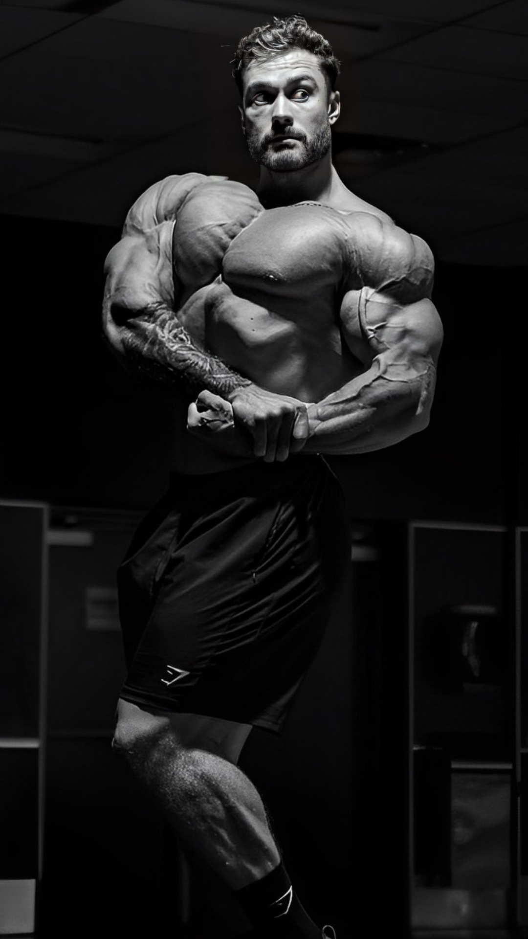 Chris Bumstead, Classic physique side pose, Gymshark athletic shorts, Full HD Phone wallpaper
